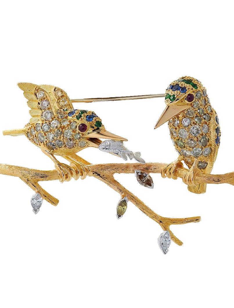 E Wolfe & Company Handmade 18 carat Yellow and White Gold Diamond, Sapphire, Tsavorite Garnet and Ruby Brooch. This Kingfishers brooch has been handmade with great attention to detail in our London Workshop. The brooch depicts two kingfishers