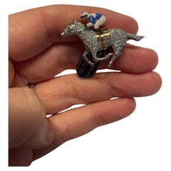 E. Wolfe & Company spilla in oro con diamanti incastonati e cavaliere in smalto