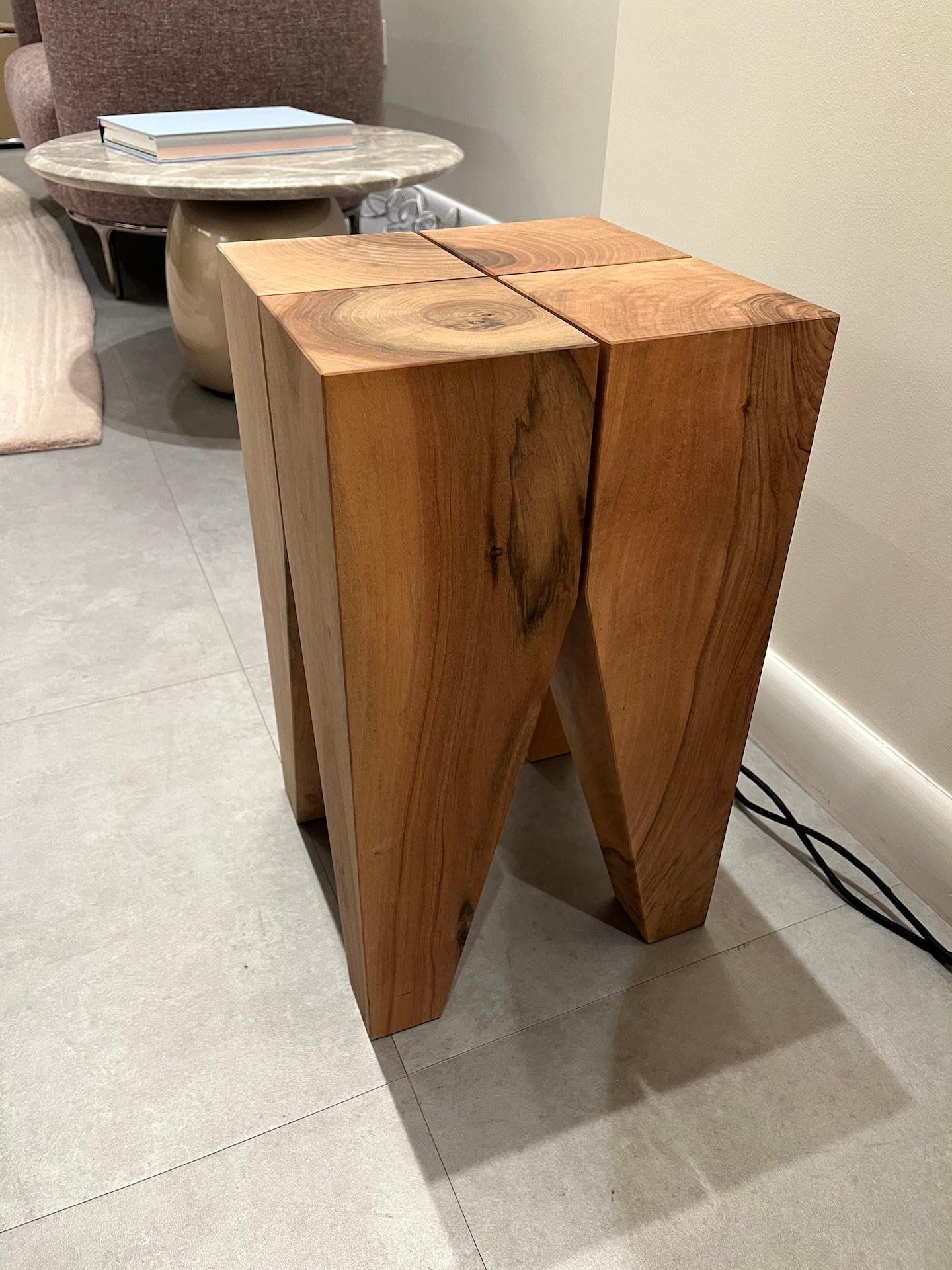 The original Backenzahn designed in 1996 by e15 founder and architect Philipp Mainzer is a modern design classic as well as an identifiable icon for e15. Crafted in Germany.
side table (with flat top) in walnut. For its signature form and detail the