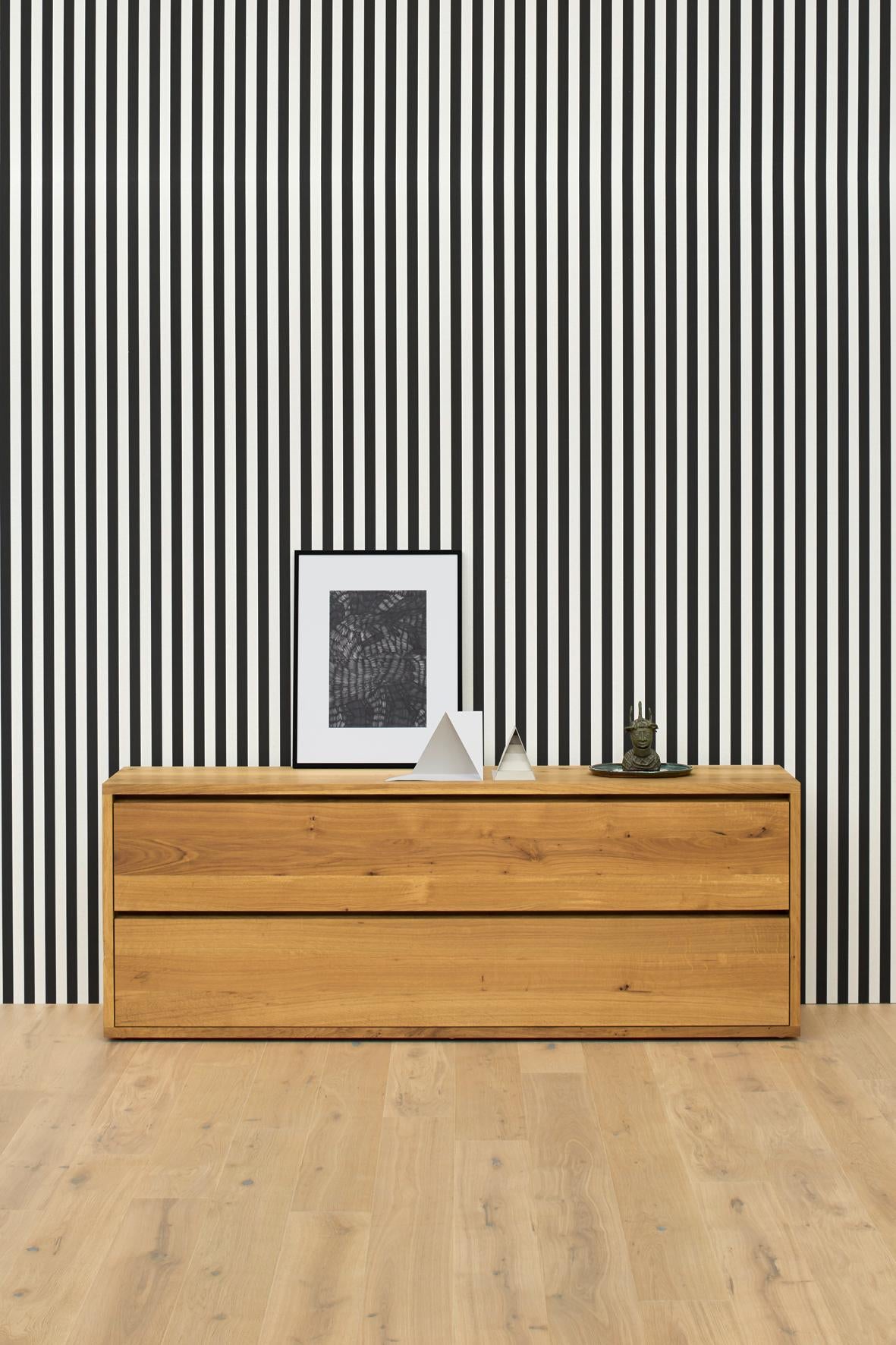 The solid wood chest of drawers IMARI expresses e15’s refined simplicity coupled with quality craftsmanship in its furniture. IMARI blends superbly with the beds MO or NOAH.

Please inquire about other finishes and sizes as they are also