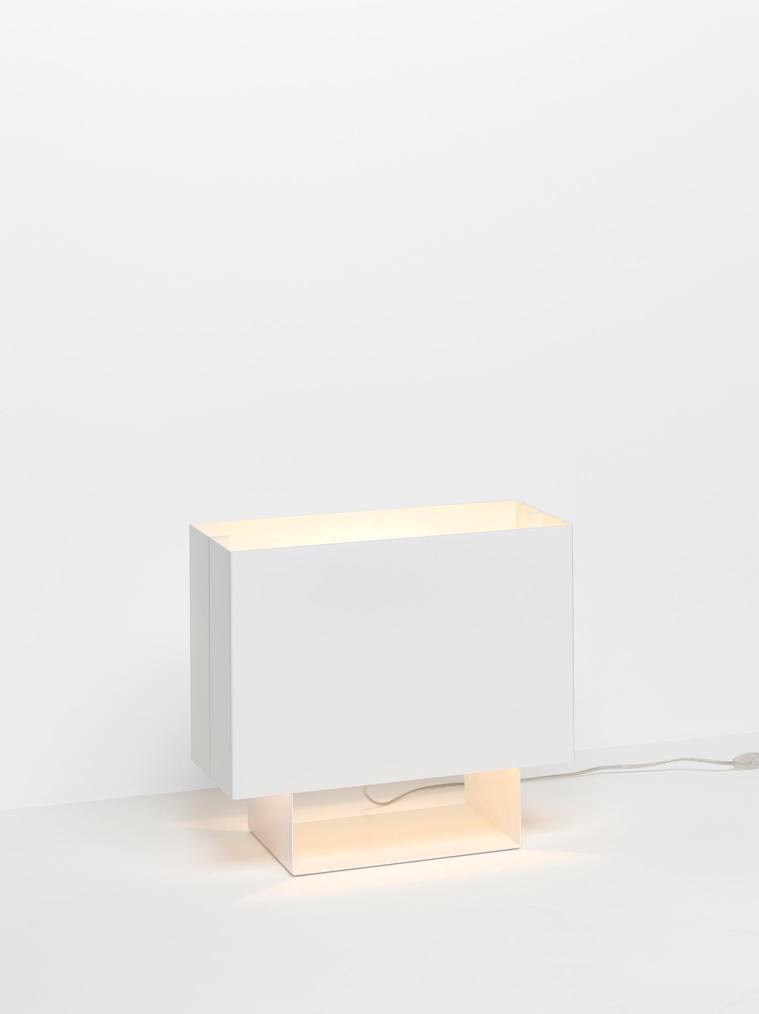 The light seam one is a modern interpretation of a Classic table light. Made of three firmly bonded components of powder-coated, folded sheet aluminum, the number of parts has been reduced to the essentials to provide the strongest focus on the