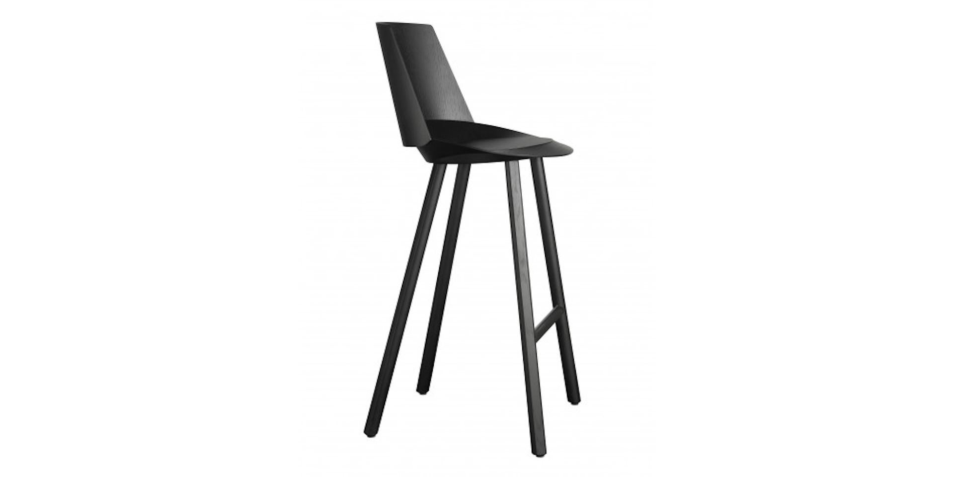 
JEAN, Stool, Oak Veneer stained, lacquered Colour: jet black,
The bar stool JEAN is a natural development of the dynamic HOUDINI chair family by Stefan Diez. JEAN consists of a seat with circumferential birm, which provides comfort and hold when