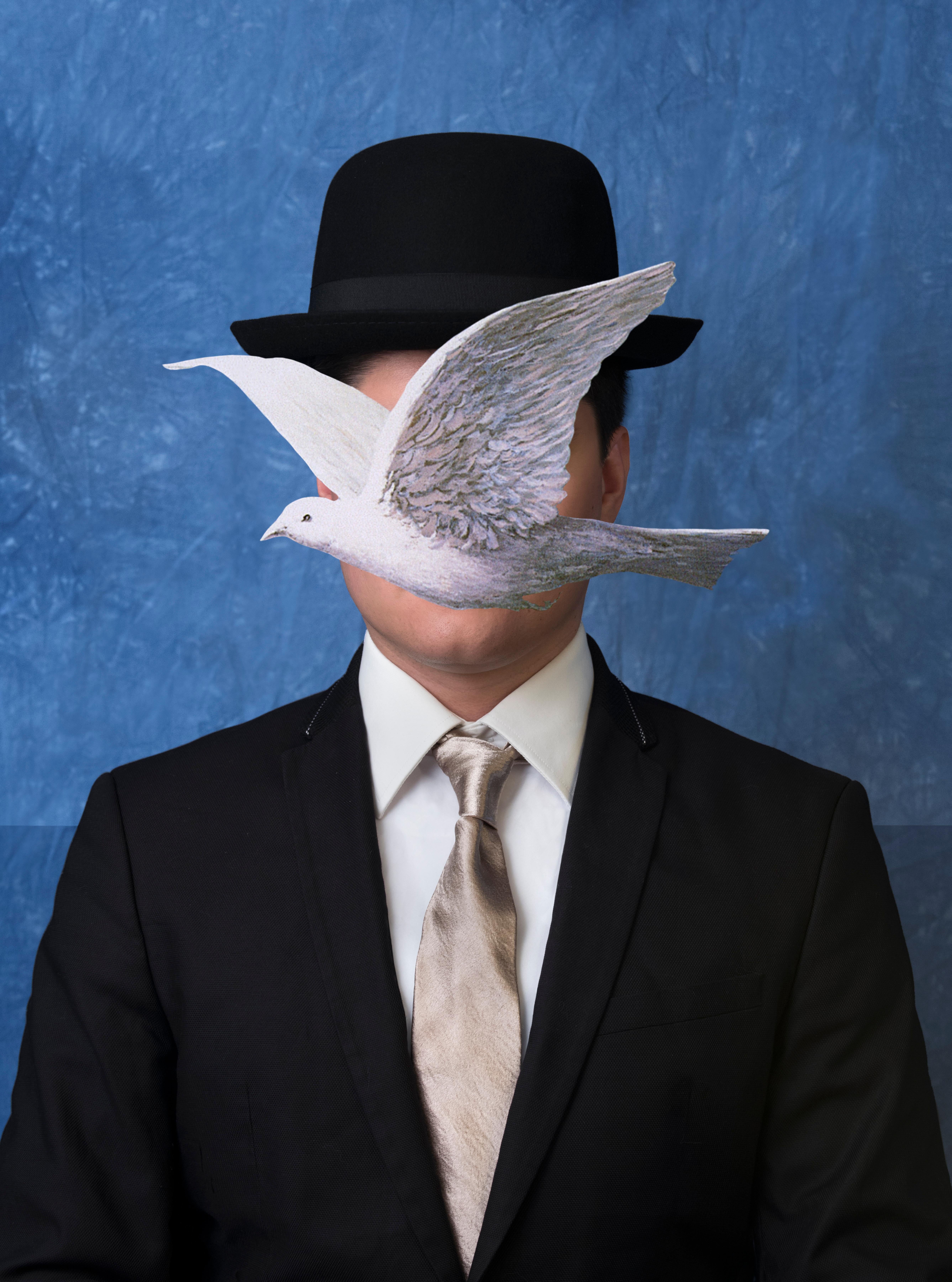 E2 - Kleinveld & Julien Figurative Photograph - Ode to Magritte's Man in a Bowler Hat