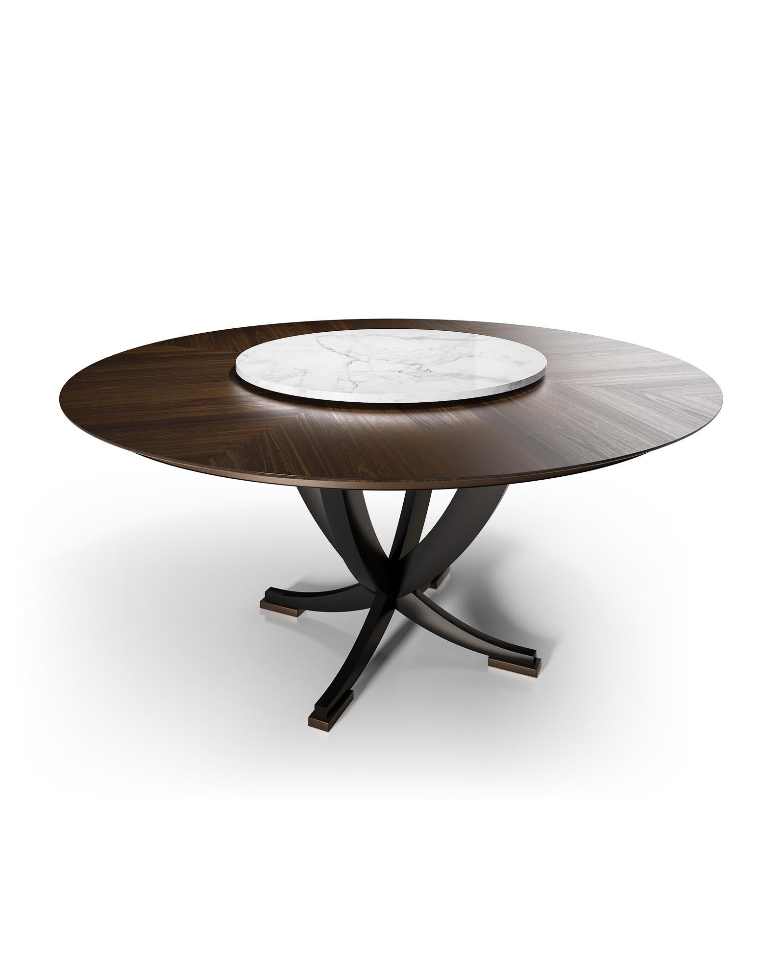 Characterized by a bold aesthetic and chiaroscuro visual contrast, this luxurious dining table will complement any modern interior. Supported by a sophisticated shape on intersecting wooden C-shaped legs, enhanced by a black velvet-like finish and