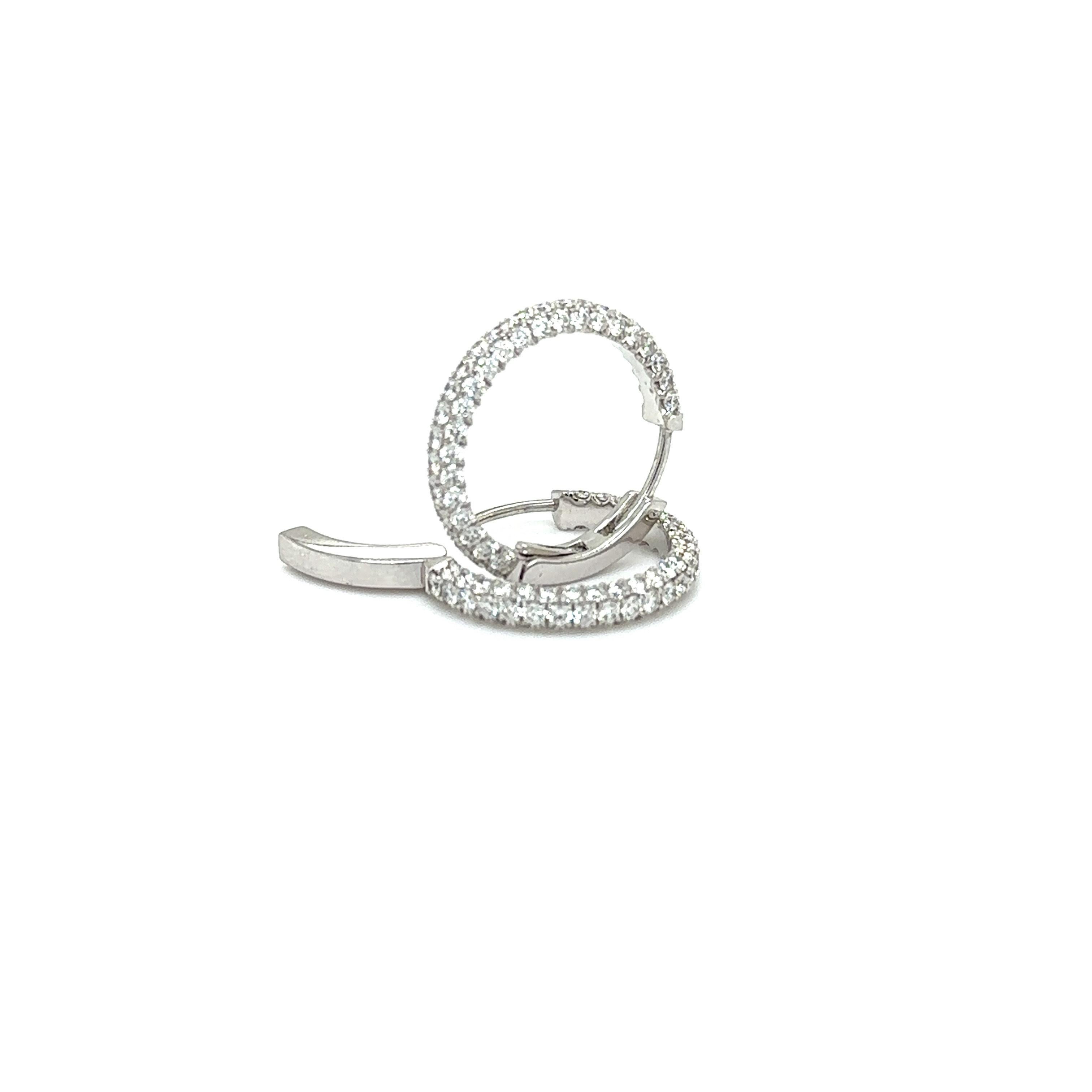 TRILLIAN COLLECTION MICRO PAVE 18K WHITE 3 Row Hoop Earrings

Metal: 18K White Gold
Diamond Info: G SI, 140 Round Brilliant Diamonds
Total Ct Weight: 2.24 cwt.
Item Weight: 5.43 gm
Measurements: 20.20 mm x 3.00 mm 

