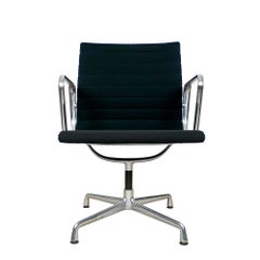 “EA 107” armchair by Charles & Ray Eames