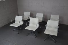 EA 108 conference chairs in off-white by Charles & Ray Eames produced by Vitra