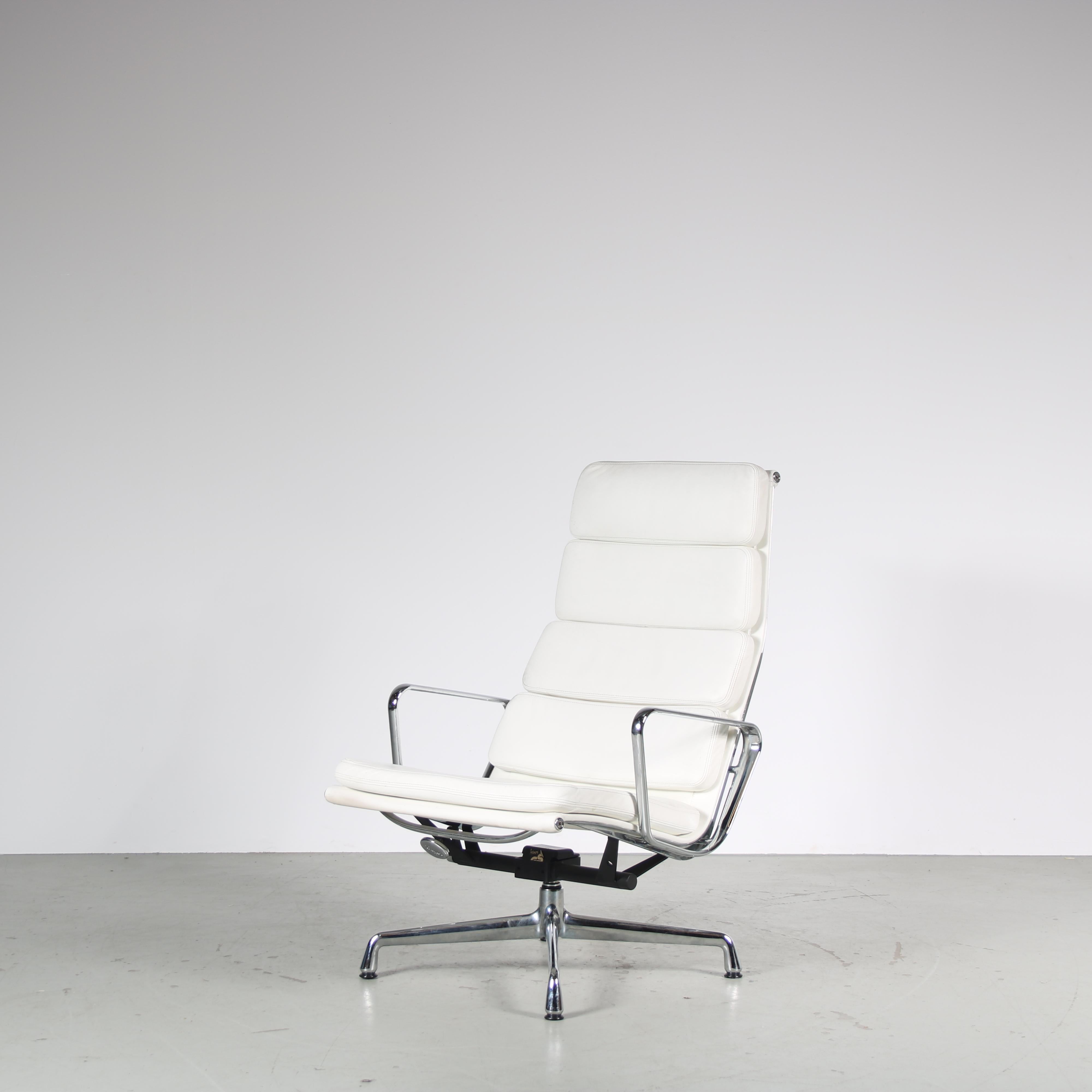 A wonderful lounge chair, model EA 222, designed by Charles & Ray Eames and manufactured by Vitra in Germany around 1990.

This eye-catching chair is a highly recognizable piece of mid-century design! It has a chrome plated metal frame with black