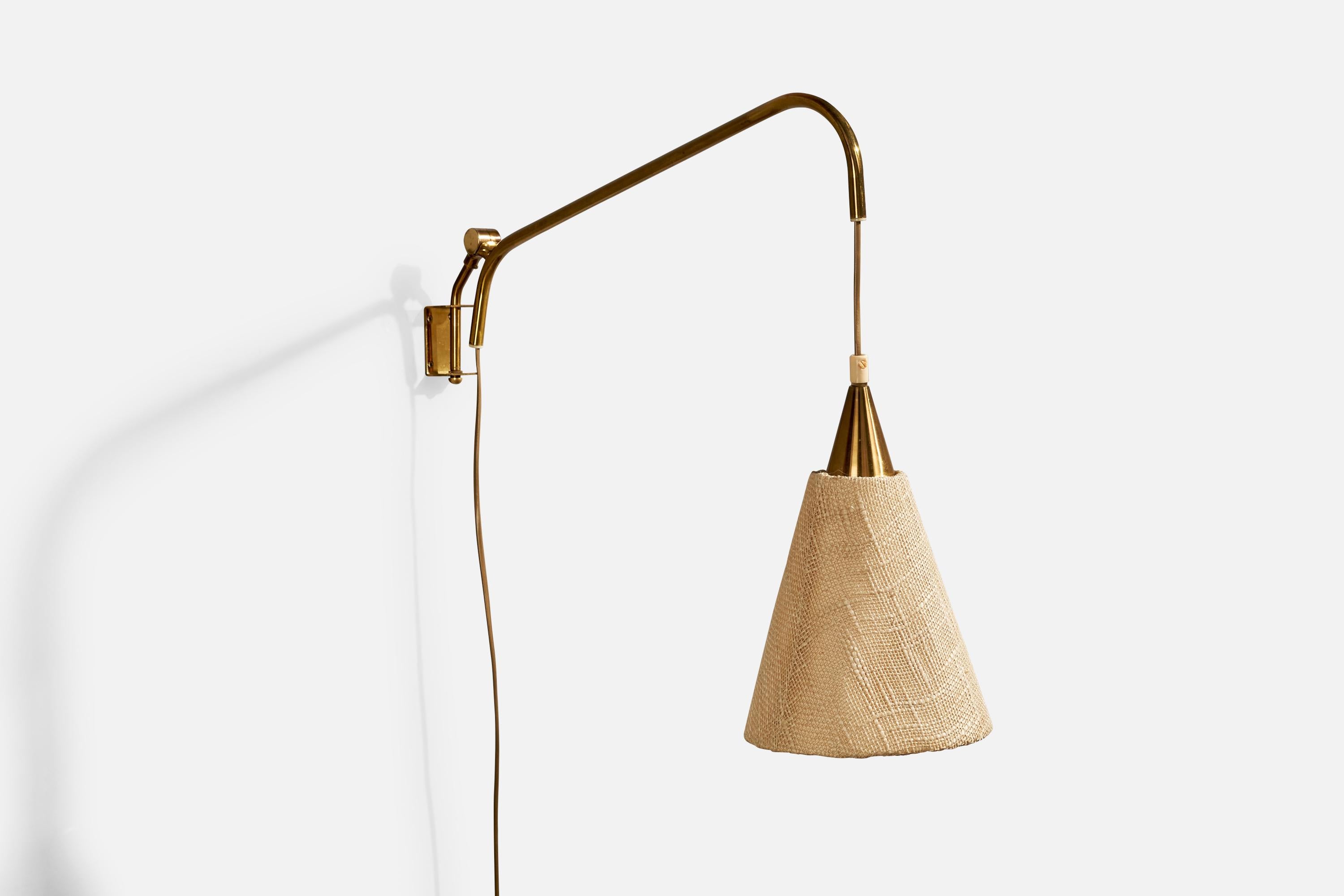 An adjustable brass and beige fabric wall light designed and produced in Sweden, c. 1940s.

Overall Dimensions (inches):  16” H x 7” W x 23.5“ D

Back Plate Dimensions (Inches):  2.5” H x 1.5” W x 1.25” D

Bulb Specifications: E-26 Bulb

Number of