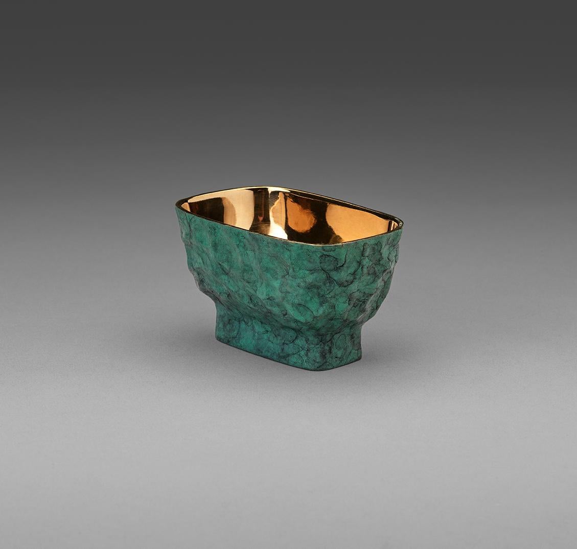 This is a bronze table boat to carry bonbons, salt or pepper. Cast using lost wax method the inner bowl is highly polished to a mirror finish. The hand-wrought exterior has a beautiful Verdigris patina and gives a stunning contrast. This table boat