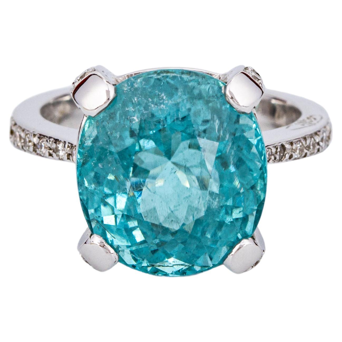 "Costis" Four Claw Ring with 11.97 crts African Paraiba Tourmaline and Diamonds For Sale