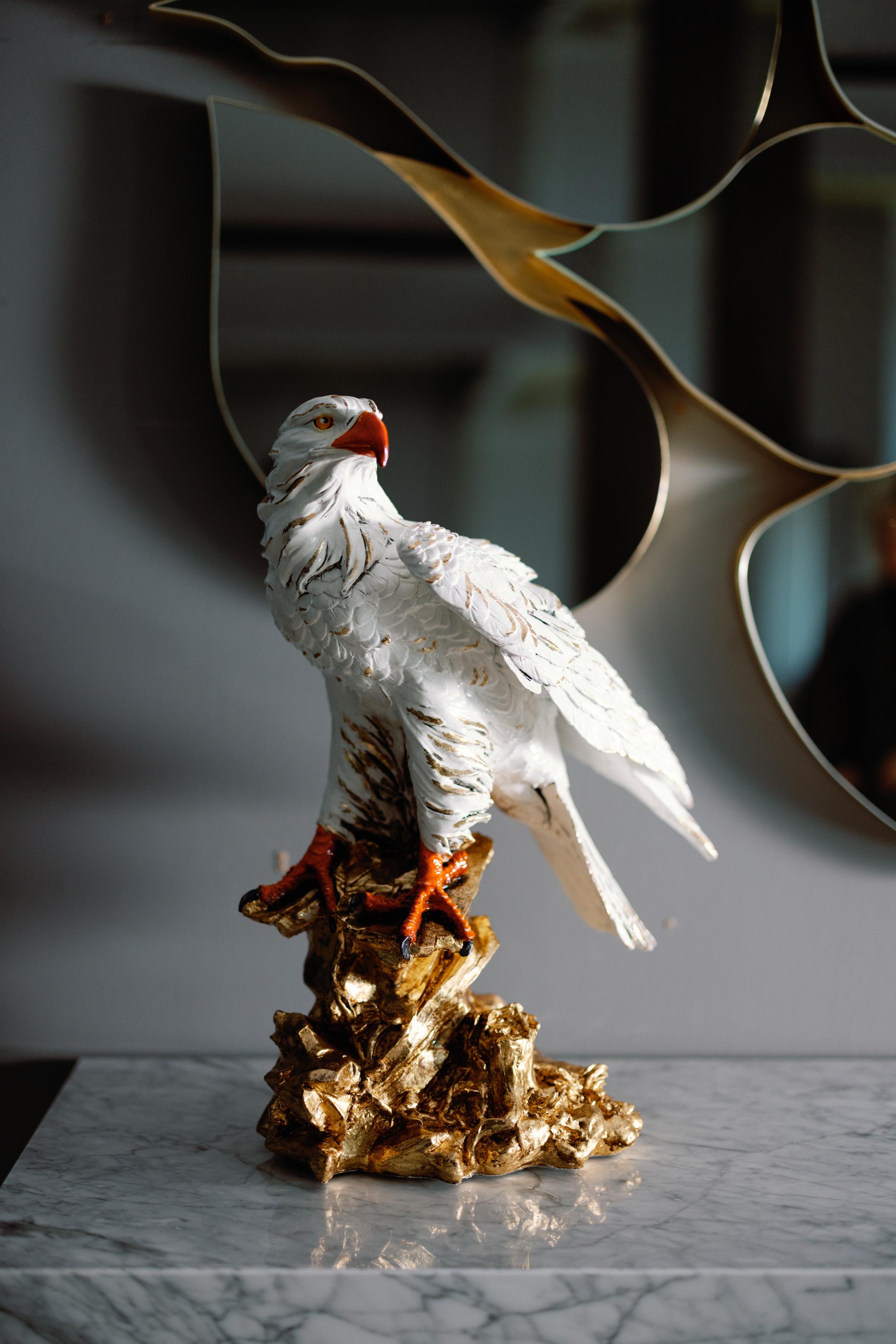 Resin Statue Eagle Imperial, Lusitanus Home Collection, by Lusitanus Home.

Decorative Eagle resin statue with hand-painted details and resin base in gold leaf applied by hand. Designed to be a unique sculpture piece standing in the room, Imperial