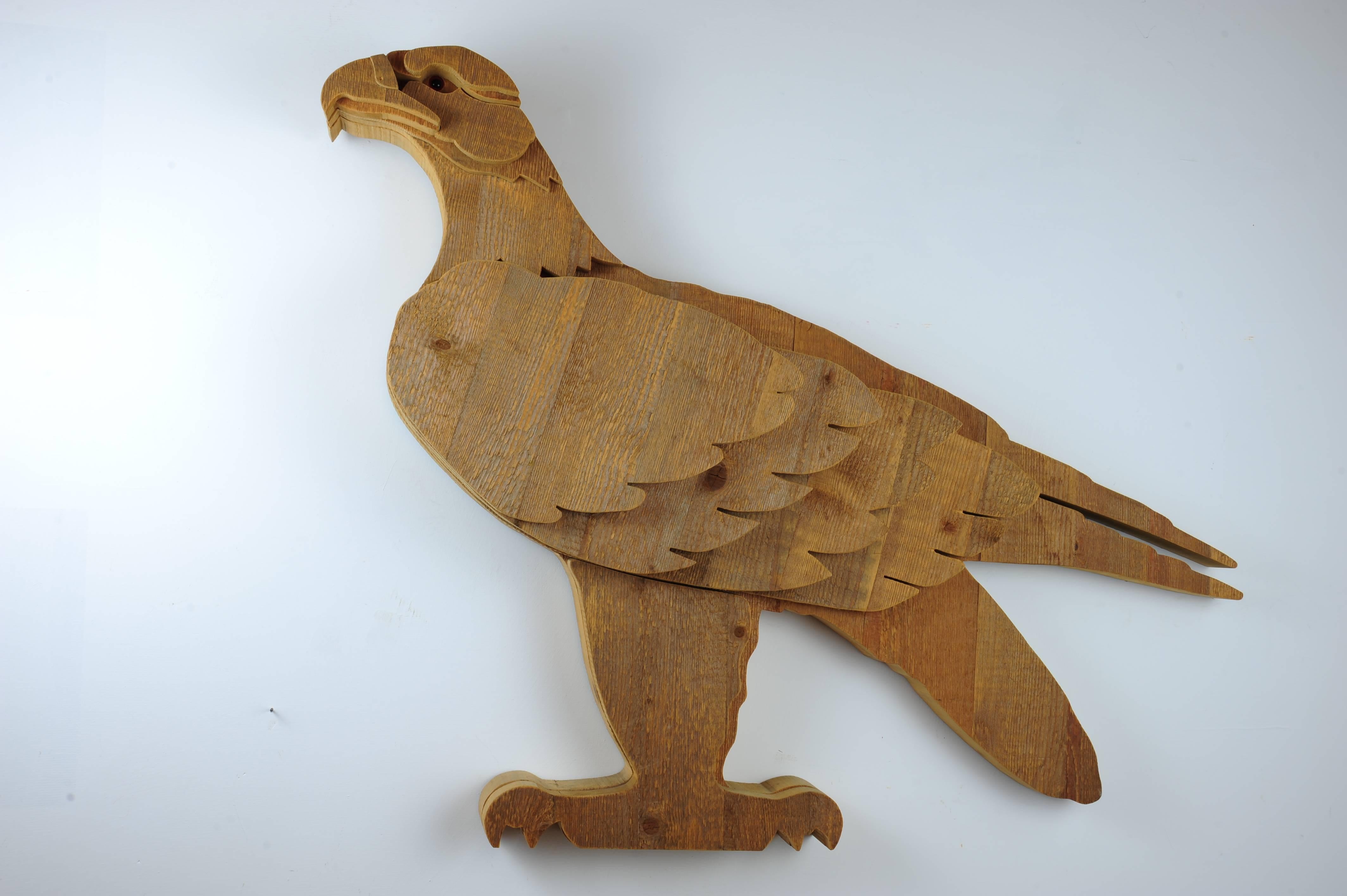 Marvellous eagle sculpture designed and made in Italy by Michelangeli. Made in seasoned solid fir wood. This ageing technique of the fir, distinctive of the Bottega G. Michelangeli, take place outdoor and provides the wood a colorings that enhances