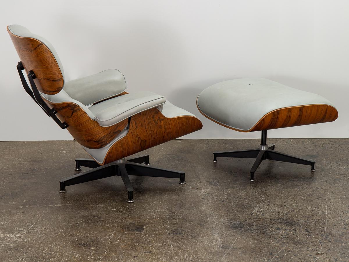 Original 670 Lounge Chair and matching 671 Ottoman, designed by Charles and Ray Eames for Herman Miller. Custom light gray leather is in nice condition—lovingly worn and comfortably plush, with a nicely broken-in patina. Rosewood frame has been