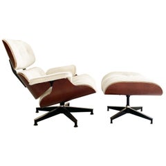 Eames 670 Lounge Chair und 671 Ottoman aus brasilianischem Rindsleder