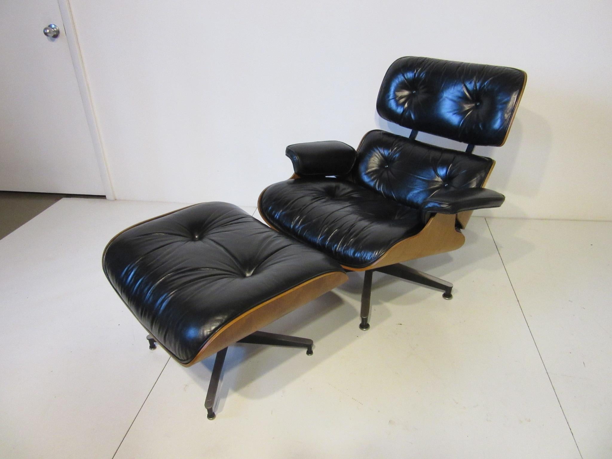 20th Century Eames Walnut 670 Lounge Chair with Ottoman by Herman Miller