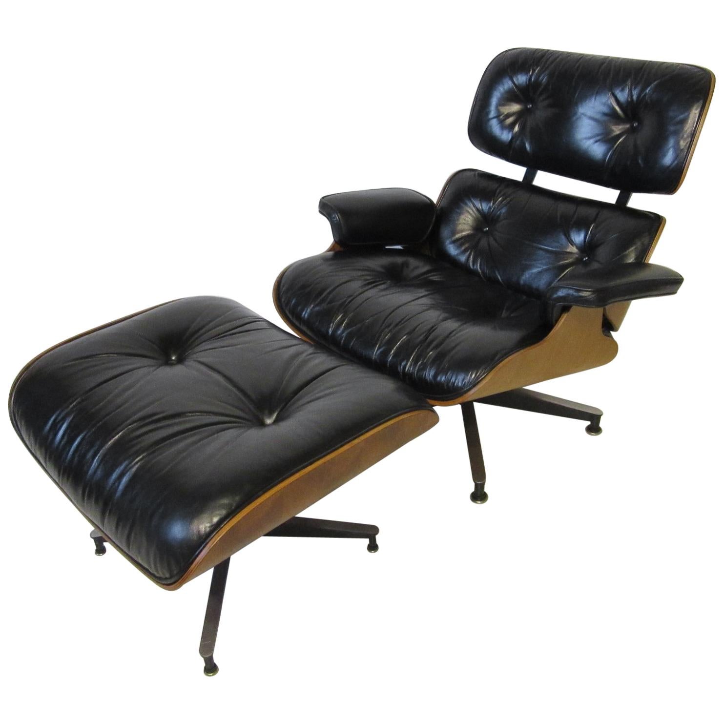 Eames Walnut 670 Lounge Chair mit Ottomane von Herman Miller