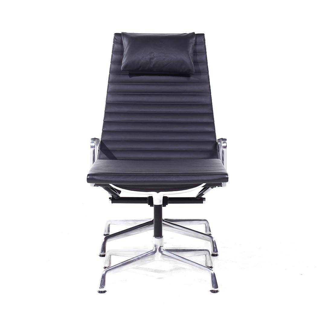 Eames Aluminum Group Chair and Ottoman

The chair measures: 25.75 wide x 31 deep x 39.5 high, with a seat height of 14.5 inches and arm height/chair clearance of 20.5 inches
The ottoman measures: 21 wide x 21.5 deep x 18 inches high

All pieces of