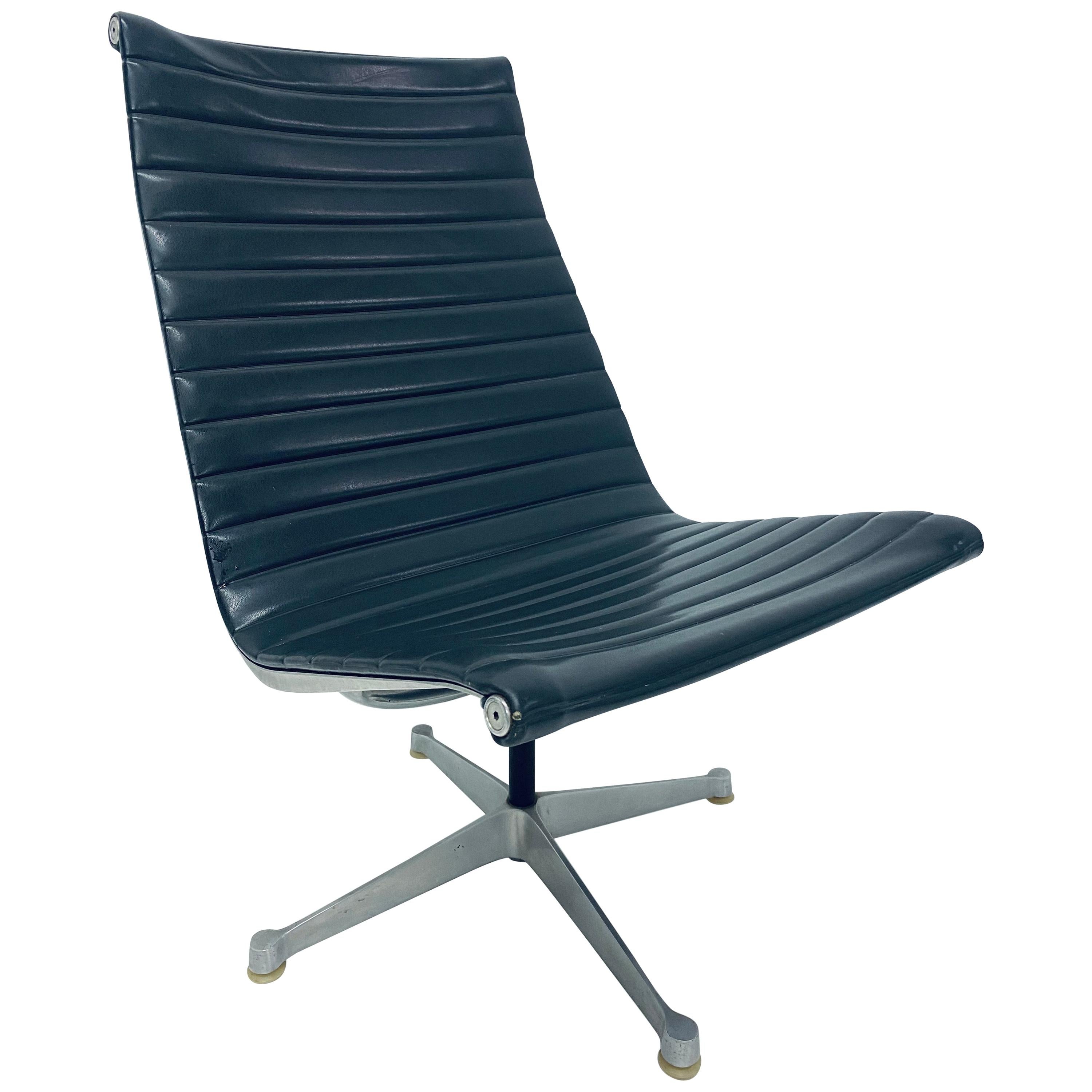 Eames Aluminum Group Dark Gray Swivel Lounge Chair for Herman Miller