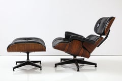 Eames Brazilianischer Loungesessel und Ottomane aus Palisanderholz