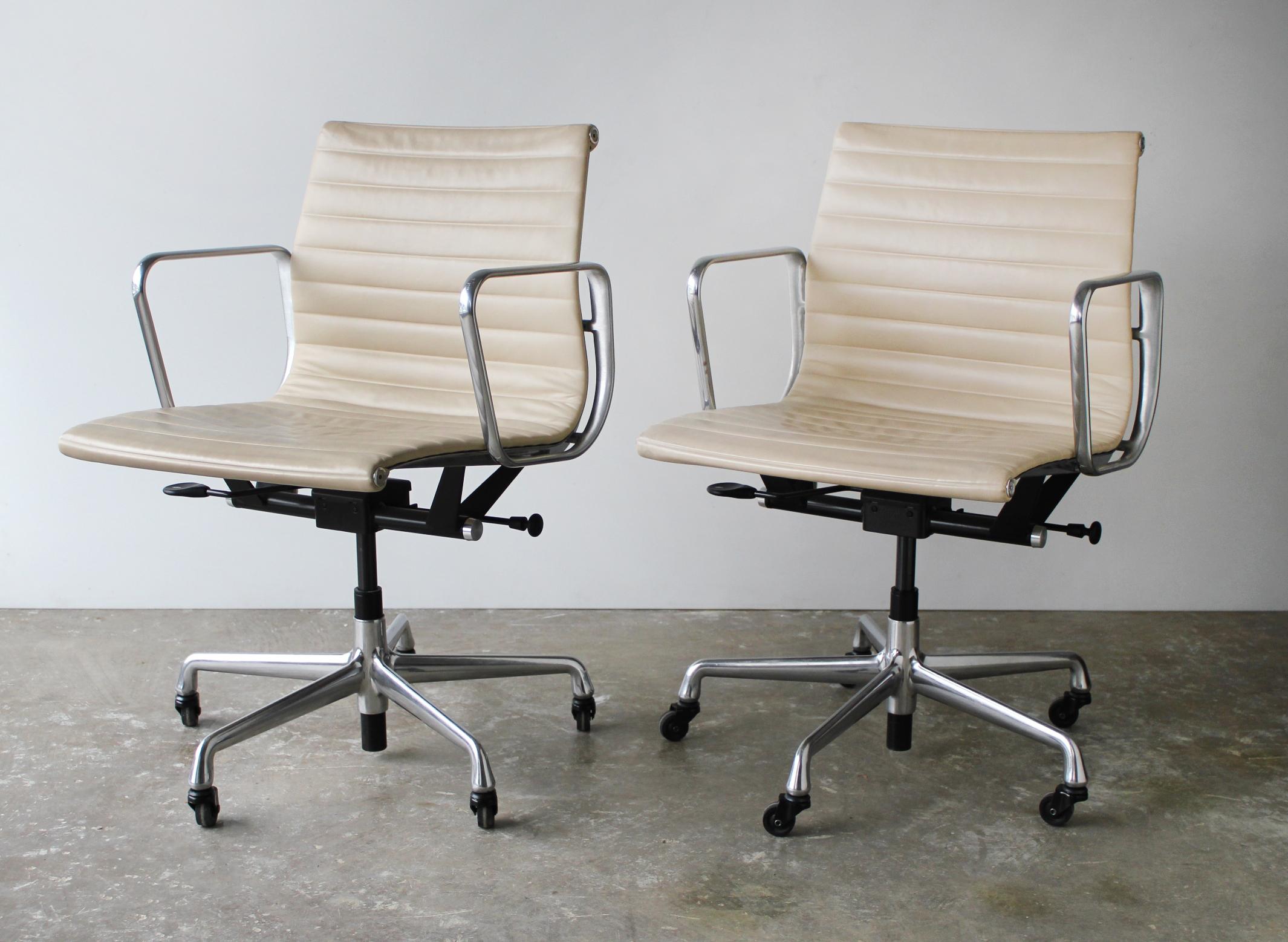 Authentic Charles and Ray Eames Aluminum Group Management chairs produced by Herman Miller. Perfect for a desk, dining or conference table. They are adjustable in height. They tilt and swivel and quite comfortable. These chairs have been lightly