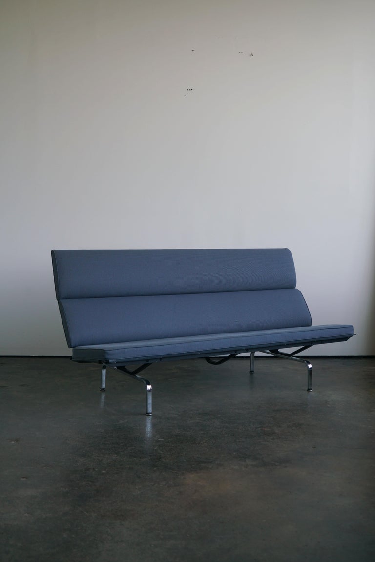 Charles and Ray Eames compact sofa for Herman Miller, 2006

Blue Upholstery

Measures: 72 1/4” x 30” D x 35” H

Condition: Very good overall condition.

(Small tear on upper left corner of the sofa as seen in picture ).