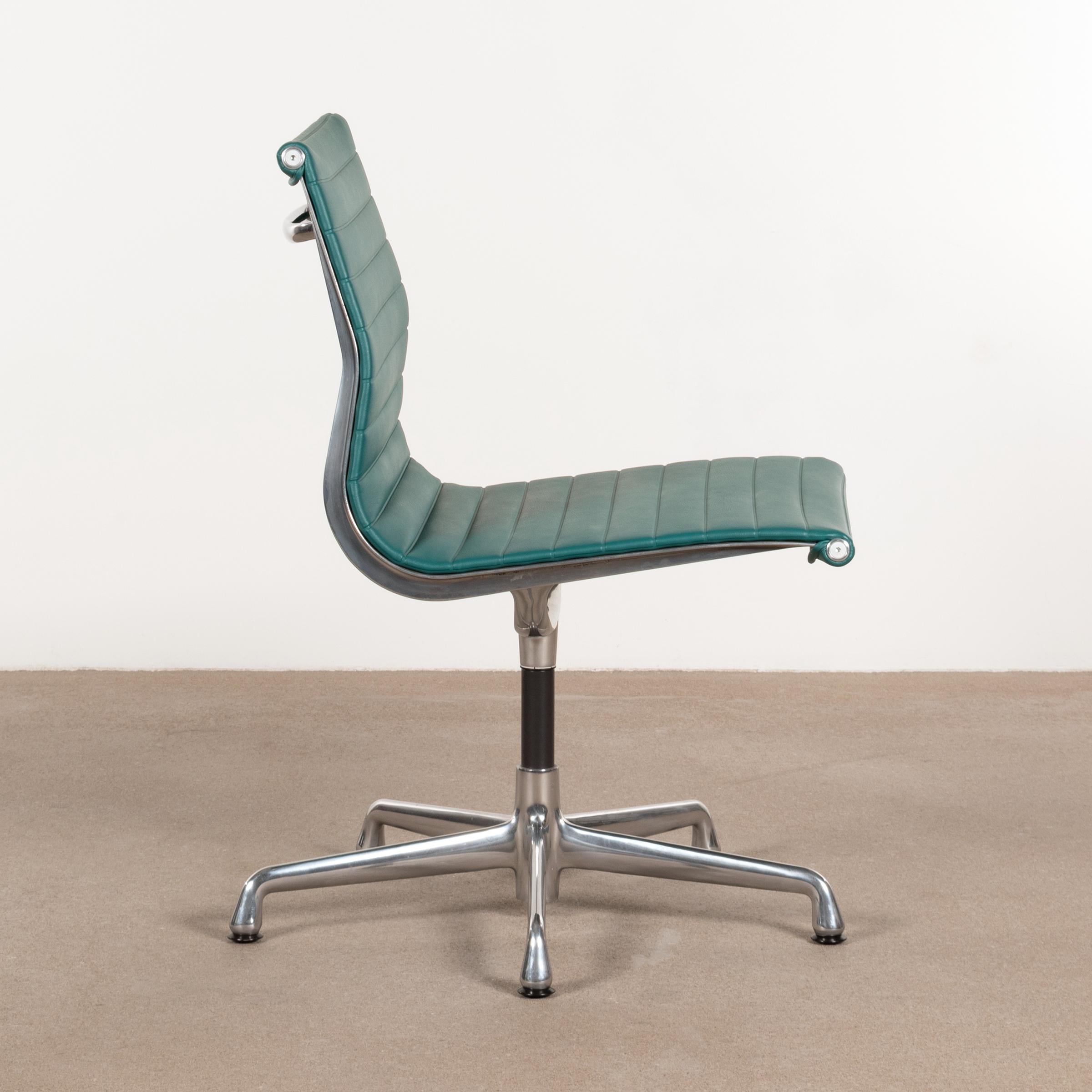 Eames EA330 conference chair in turquoise vinyl with five-star base and swivel mechanism. Very good original condition signed with manufacturer's label. Multiple chairs available.