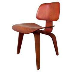 Eames DCW in Original Red Aniline Dye