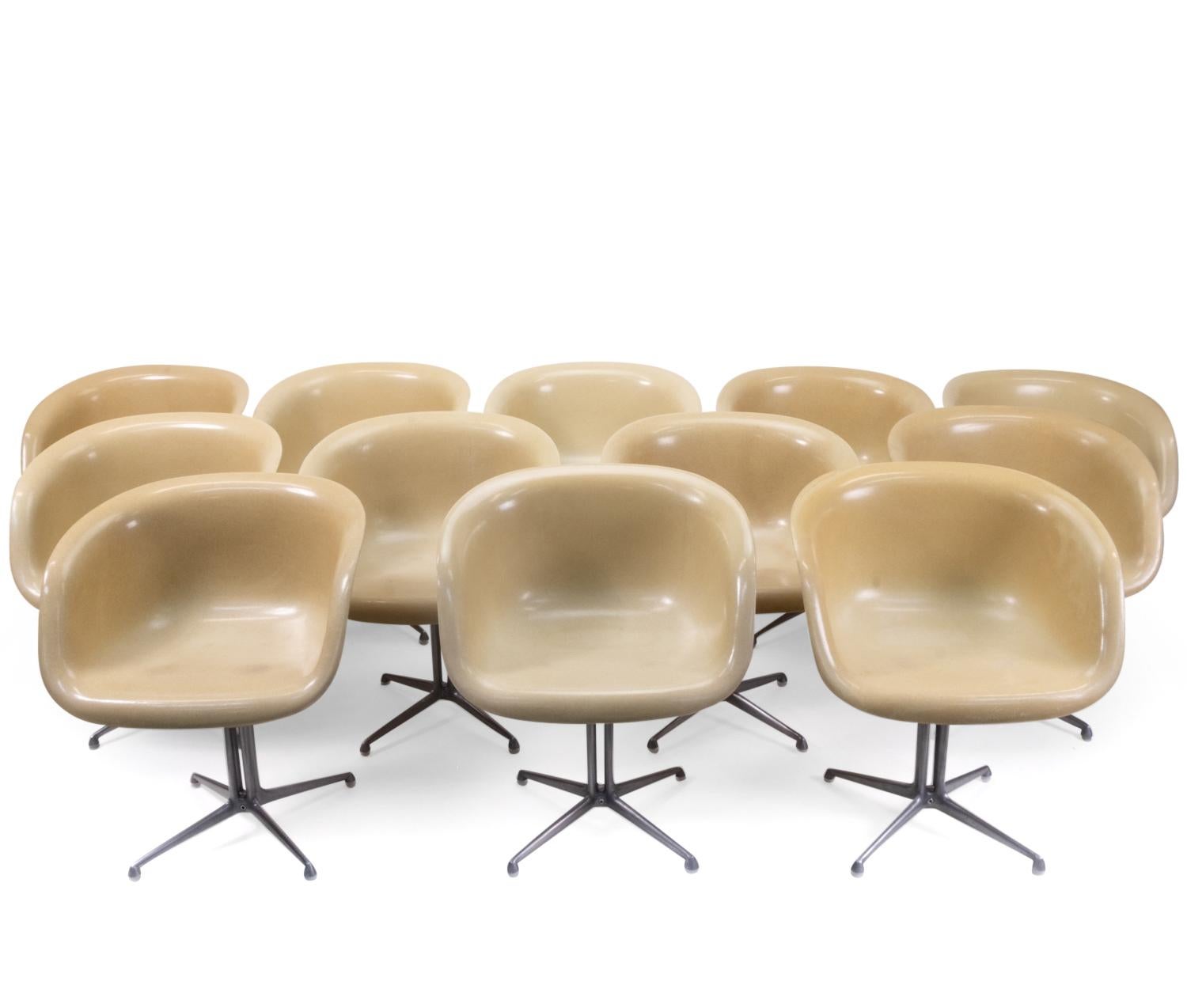 Eames low back armchairs with aluminum base. Designed by Charles & Ray Eames in co-operation with Alexander Girard.

The la Fonda chair was originally designed by the Eames’ couple for the “La Fonda Del Sol” restaurant in the Time Life Building
