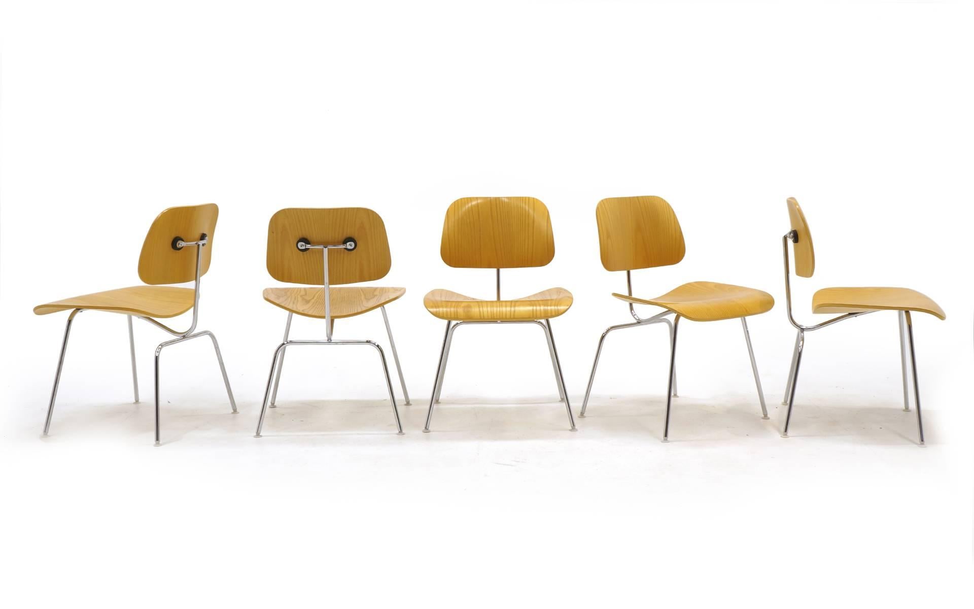 Set of ten Charles and Ray Eames designed DCMs (Dining Chair Metal) for Herman Miller. Classic, timeless design.