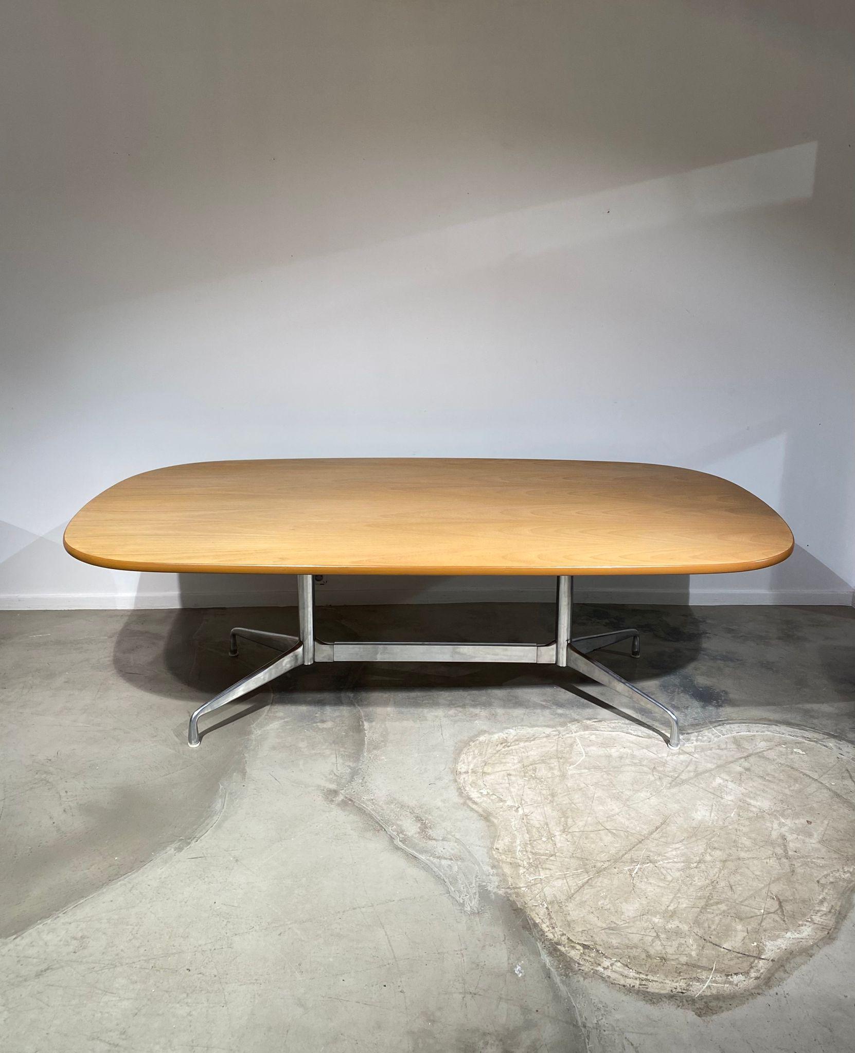 Amazing light wood dining table by Eames.