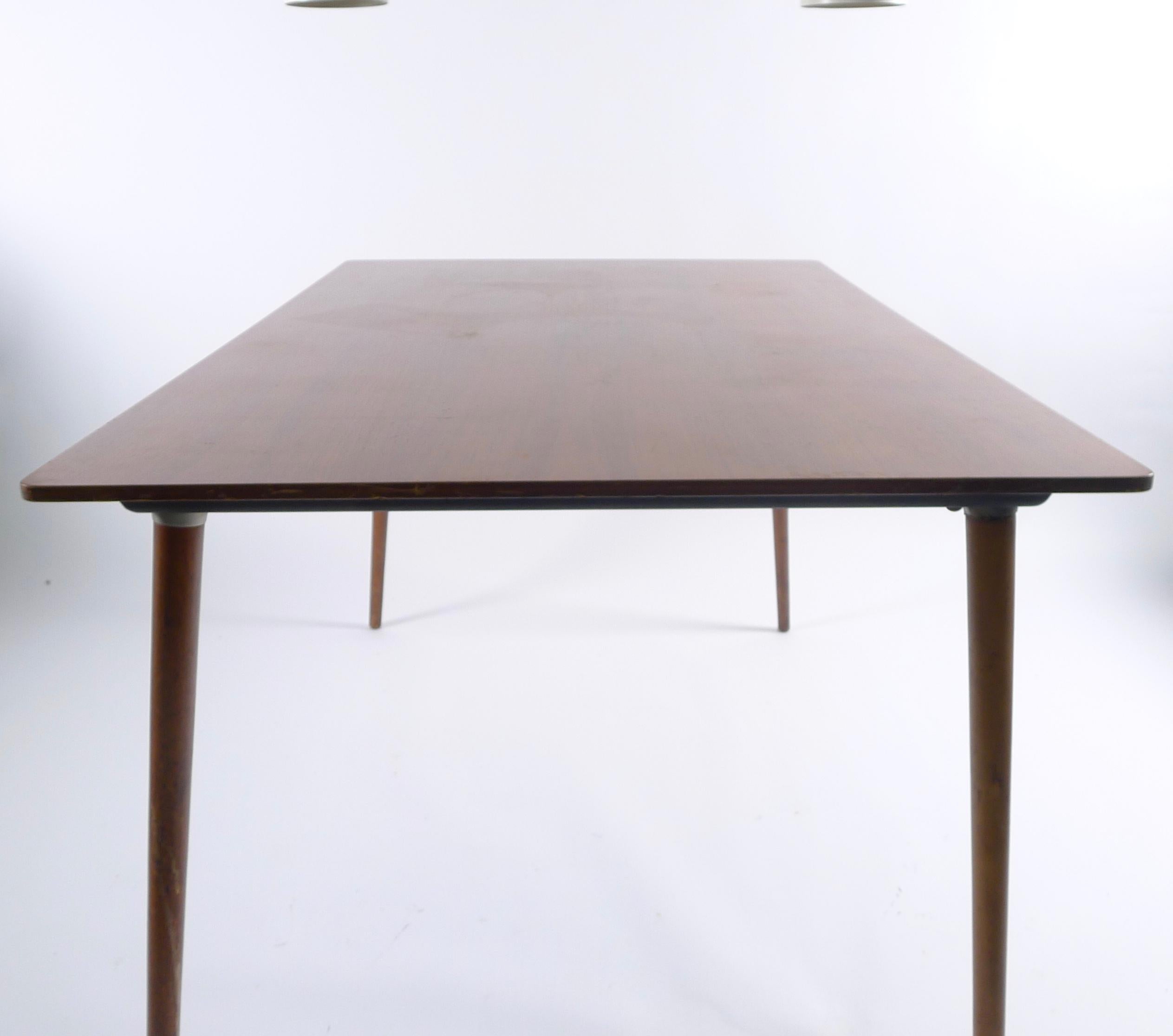Mid-Century Modern Eames DTW-3 table, rectangular, tapering circular wood detachable legs, 1950