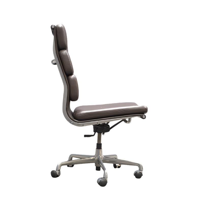 Soft Pad EA219 High Back Leather Office Chair: This high back leather office chair by Charles & Ray Eames for Vitra, crafted in the 1990s, offers a blend of comfort and modern design. Perfect for any office space, adding both style and functionality.