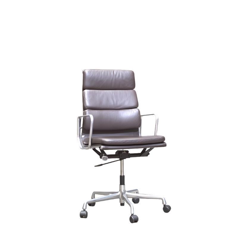 Soft Pad EA219 High Back Leather Office Chair: This high back leather office chair by Charles & Ray Eames for Vitra, crafted in the 1990s, offers a blend of comfort and modern design. Perfect for any office space, adding both style and functionality.