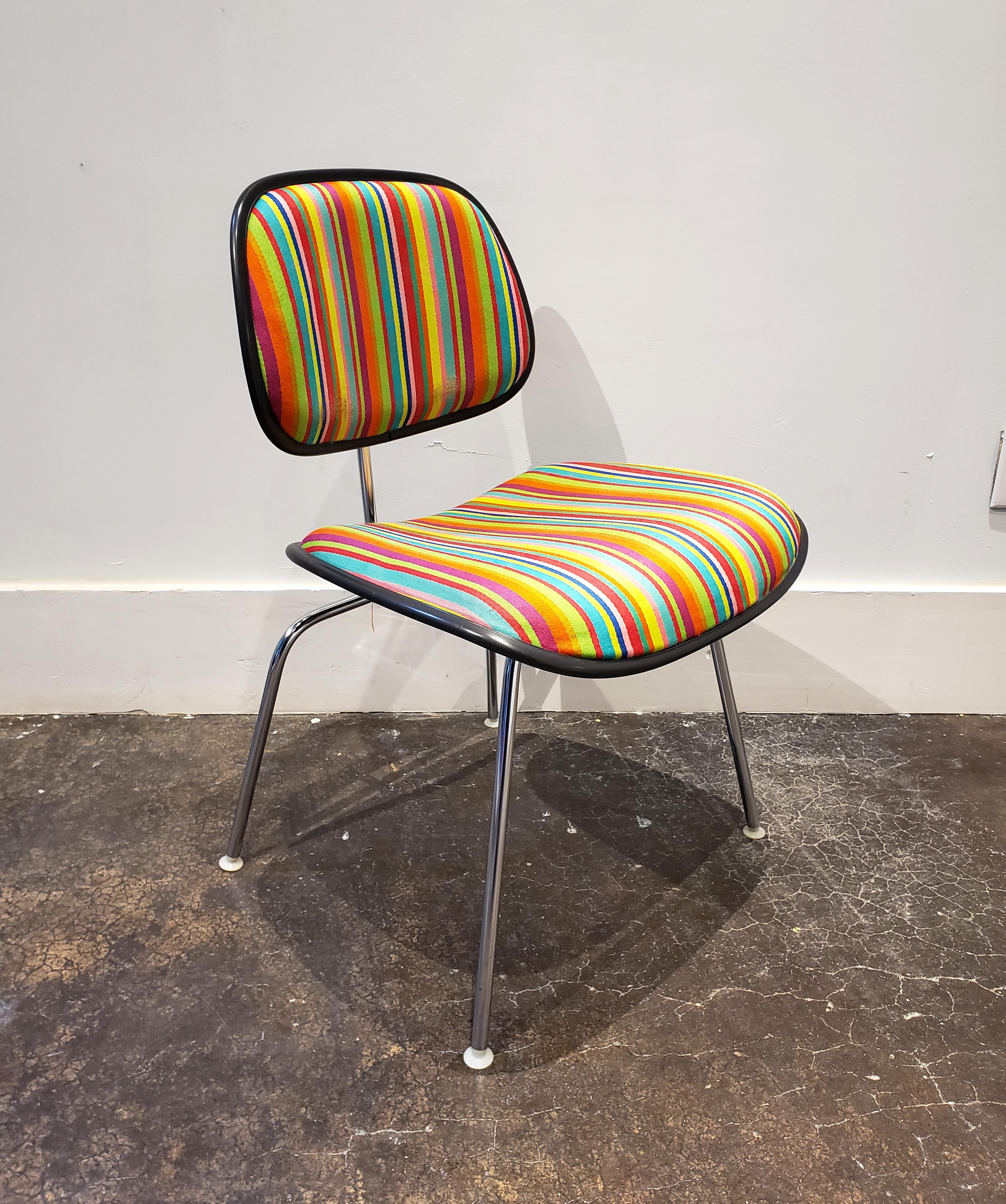 Eames EC127 padded DCM chair with rare Alexander Girard designed fabric. Manufactured circa 1990 by Herman Miller Furniture in Michigan. Good vintage condition, light wear to fabric on backrest (see pictures).