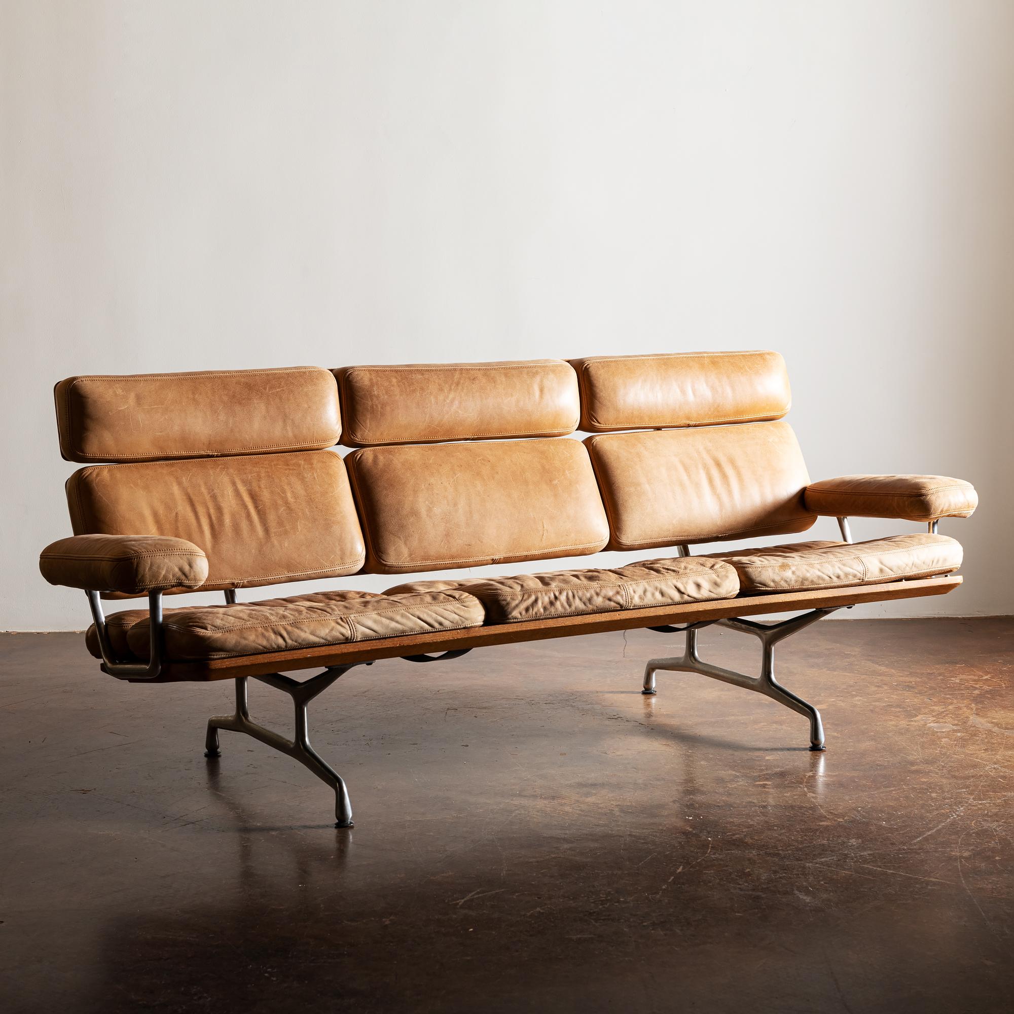 A special example of the Eames ES 108 Sofa in beautifully patinated carmel leather and walnut. For Herman Miller, 1984.