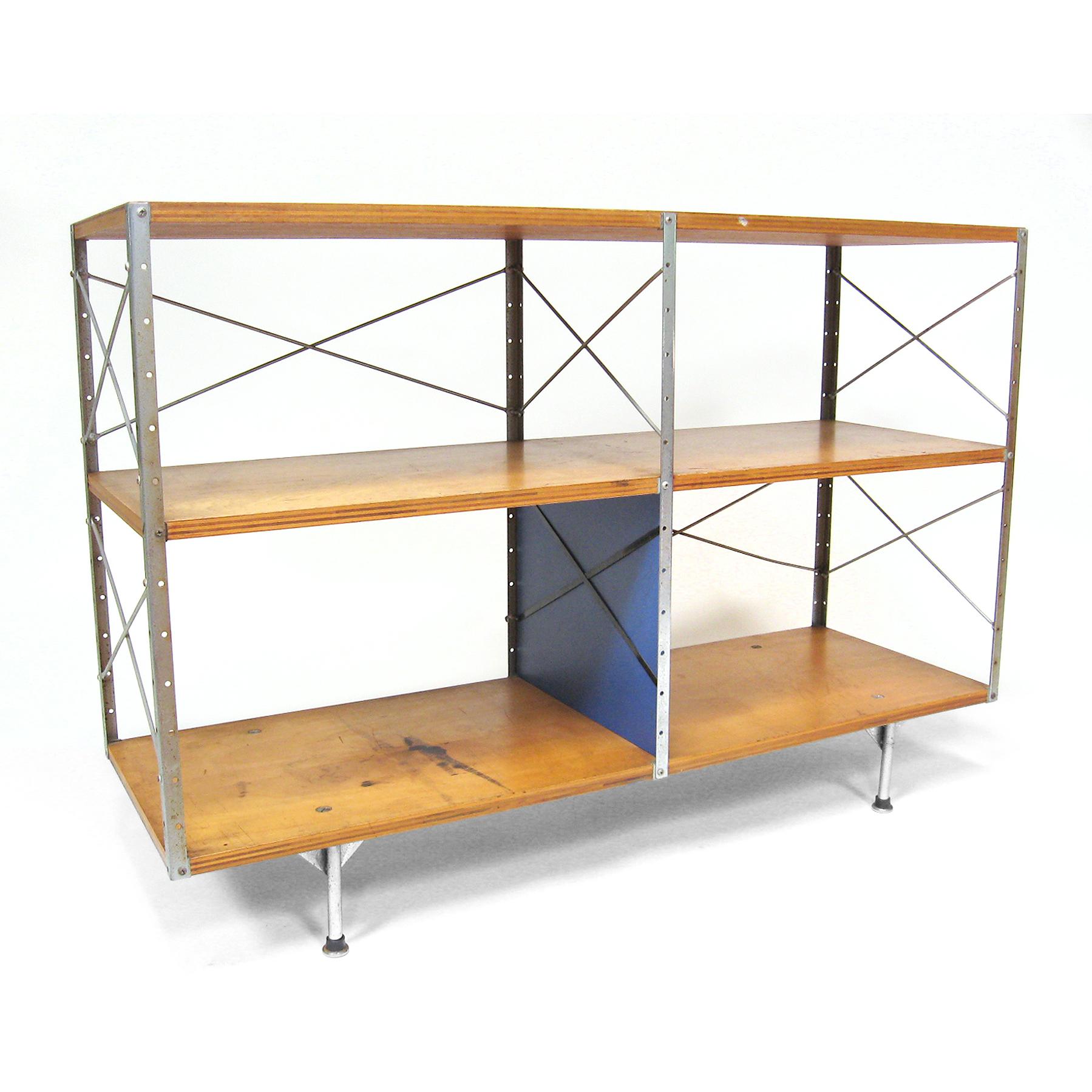 This is a terrific example of the rare and important ESU (Eames Storage Unit) designed by Charles and Ray Eames for Herman Miller. Utilizing industrial materials such as plywood, angle iron and Masonite, the Eameses created a simple, elegant storage