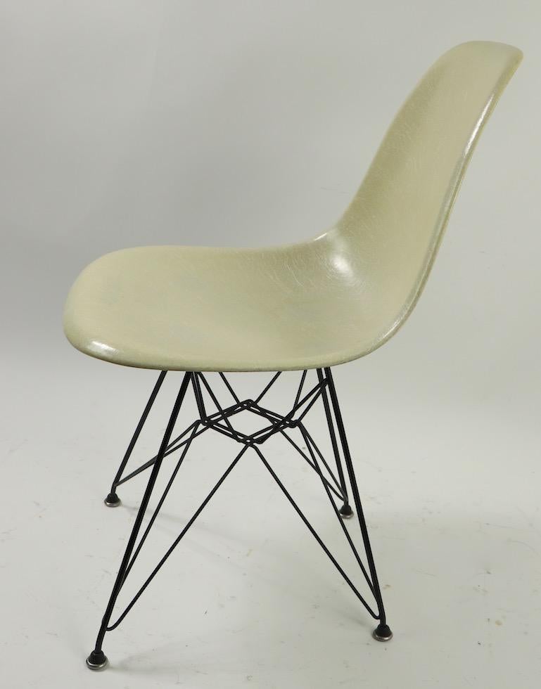 Great condition Eames for Herman Miller fiberglass shell chair on Eiffel Tower cage base. This extraordinary chair is completely original, fully and correctly marked and dated 1957. Iconic form, important and influential design, chic, stylish and