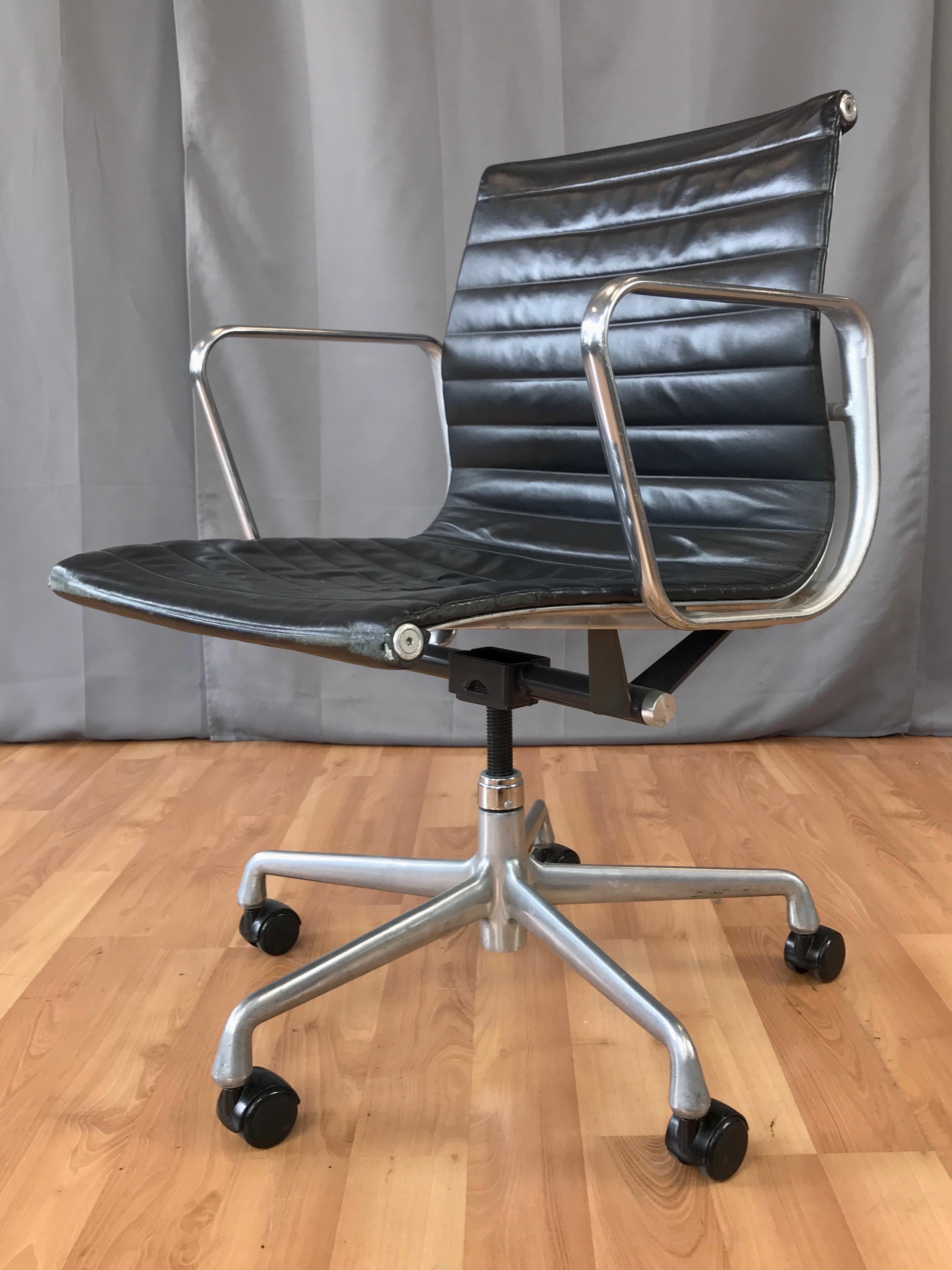 A special limited edition 50th Anniversary black leather Aluminum Group Management Chair by Charles and Ray Eames for Herman Miller, designed in 1958 and produced in 2008.

A Mid-Century Modern design icon, with clean lines and Minimalist cast