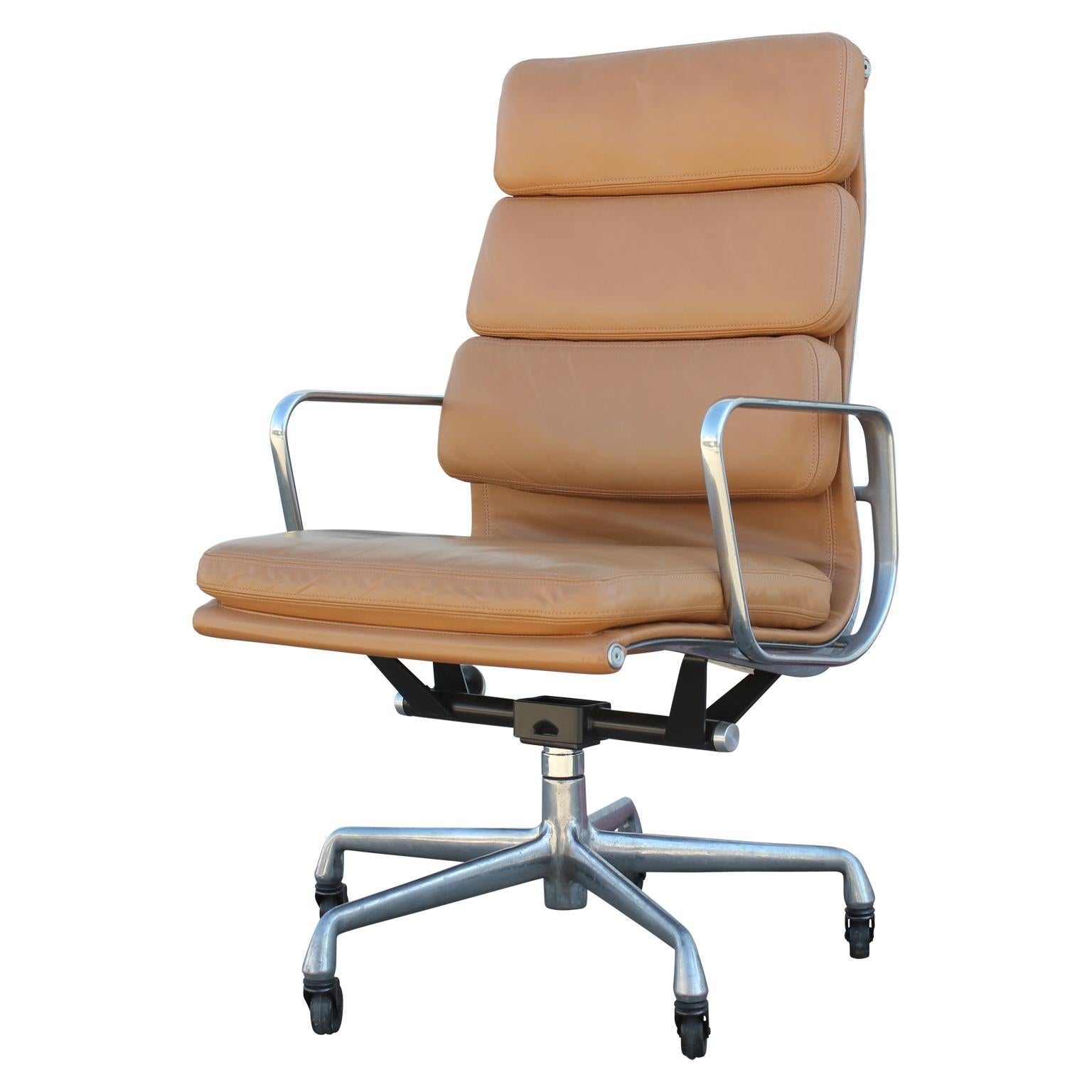 Gorgeous modern soft pad executive desk chairs with a high back and on casters designed by Charles Eames for Herman Miller's Aluminum Group line. We have up to 4 available for purchase.
