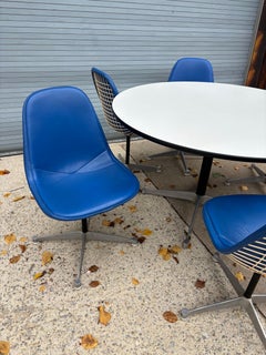 Tavolo e 6 sedie in alluminio Eames per Herman Miller