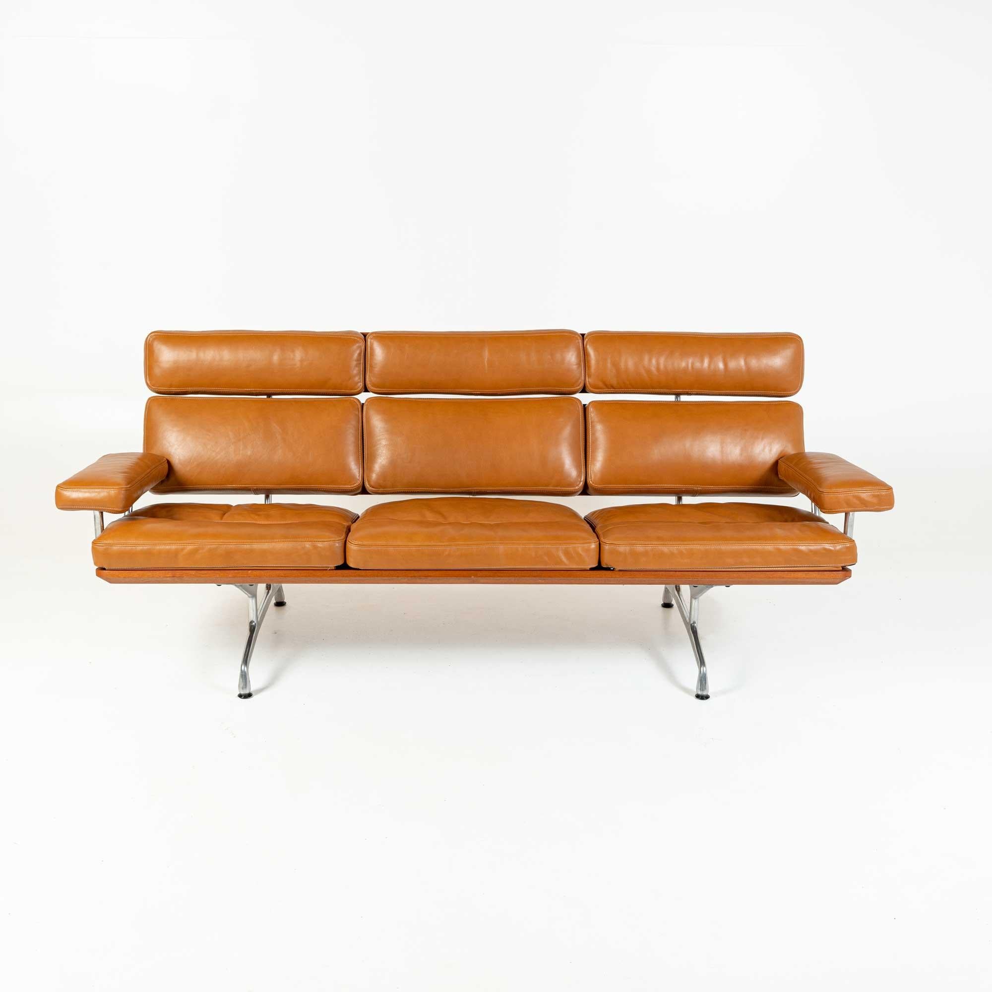 This is the iconic Eames Sofa in teak and reupholstered in top of the line Maharam Sorghum Aniline leather. Very minimal wear on the frame. Some natural marking on the leather. Overall in great restored condition ready for use.

The Eames was the