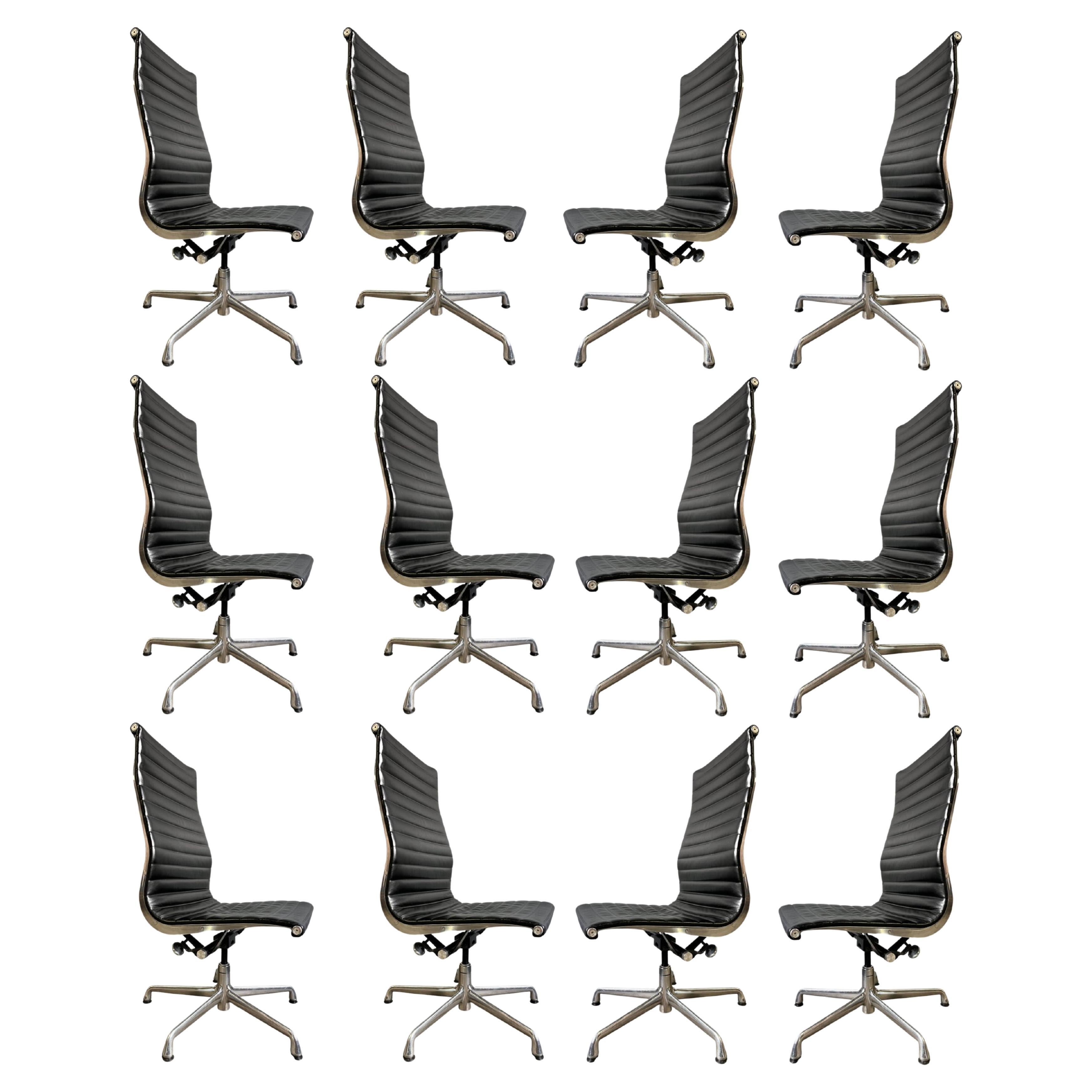 Sold individual. 30 available !

Eames for Herman Miller Aluminum Group chairs in premium plush black leather with high-backs. We have many sets that had been used as dining chairs with foot glides and armless. Also available with casters. A very