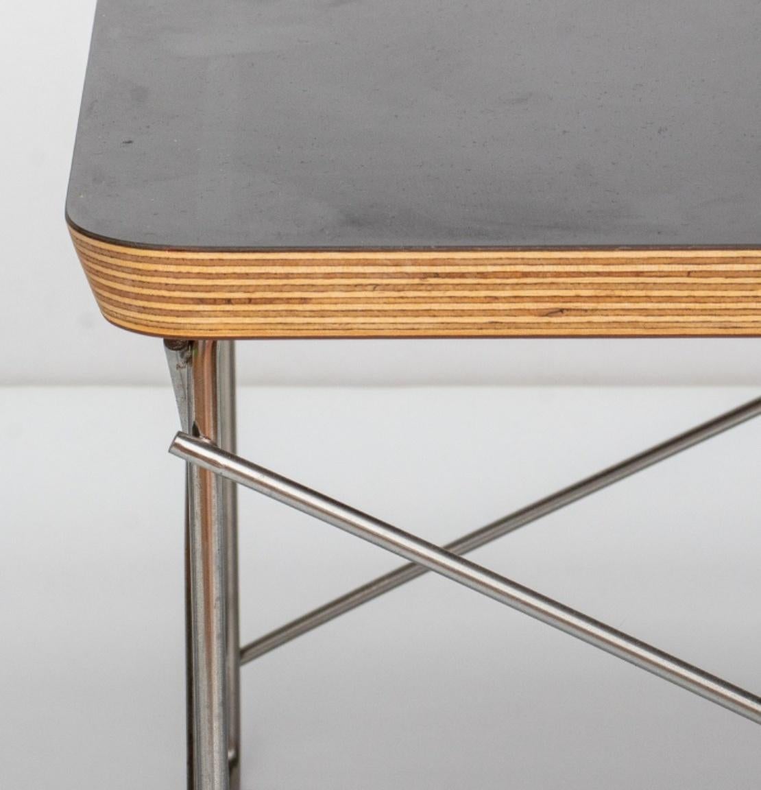 Eames for Herman Miller pair of Modern LTR side tables with black tops, marked on bottom.

Dimensions: 10