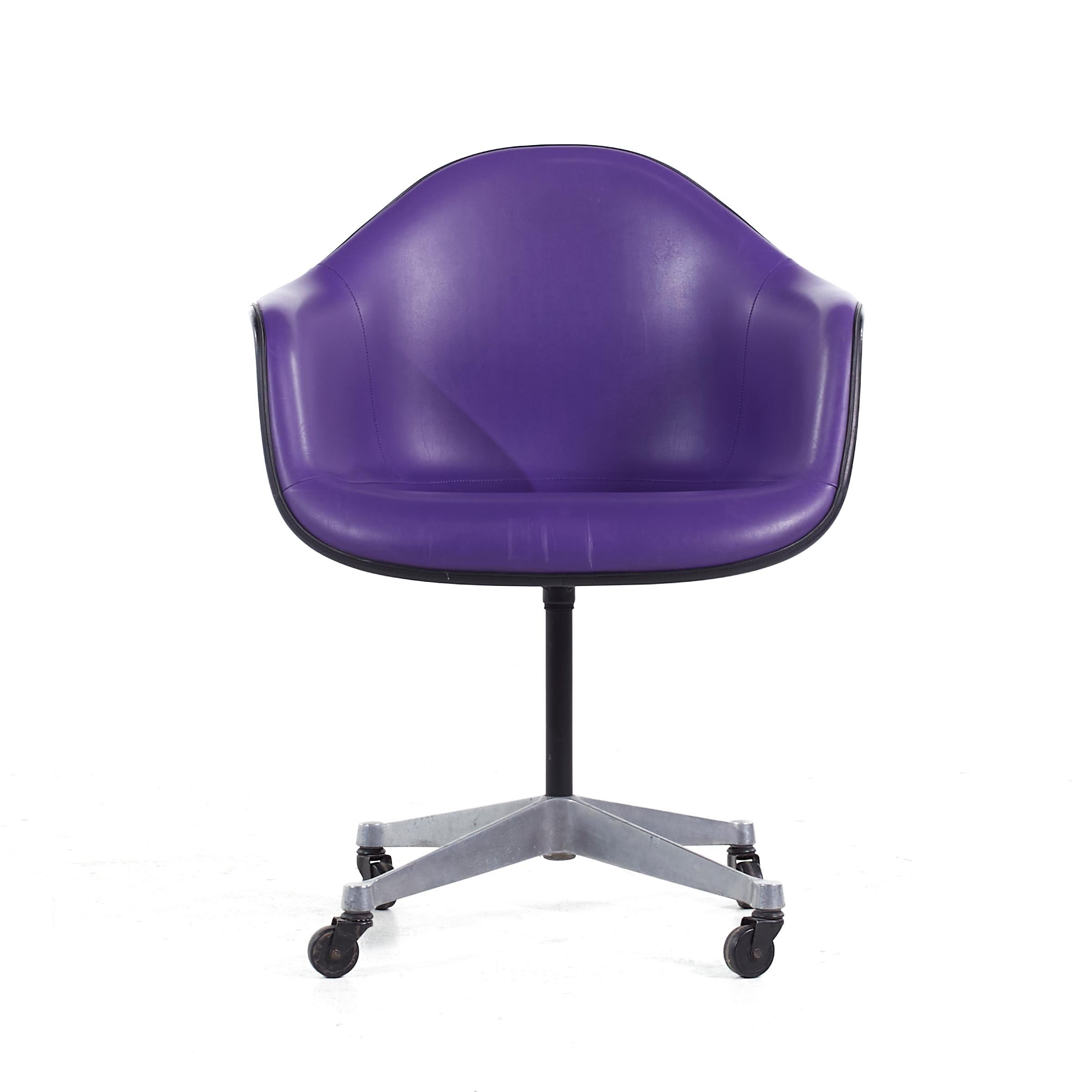 Eames for Herman Miller Mid Century Purple Padded Fiberglass Swivel Office Chair

This office chair measures: 25.5 wide x 24 deep x 32.75 high, with a seat height of 18.5 and arm height/chair clearance 26 inches

All pieces of furniture can be had