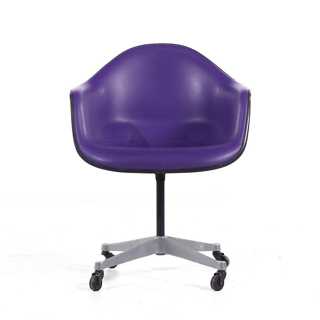 Eames for Herman Miller Mid Century Purple Padded Fiberglass Swivel Office Chair

This office chair measures: 25.5 wide x 24 deep x 32.75 high, with a seat height of 18.5 and arm height/chair clearance 26 inches

All pieces of furniture can be had