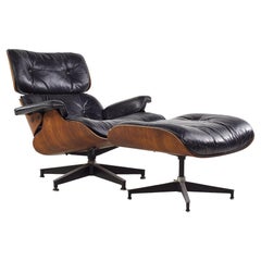 Eames pour Herman Miller fauteuil de salon mi-siècle en bois de rose avec pouf