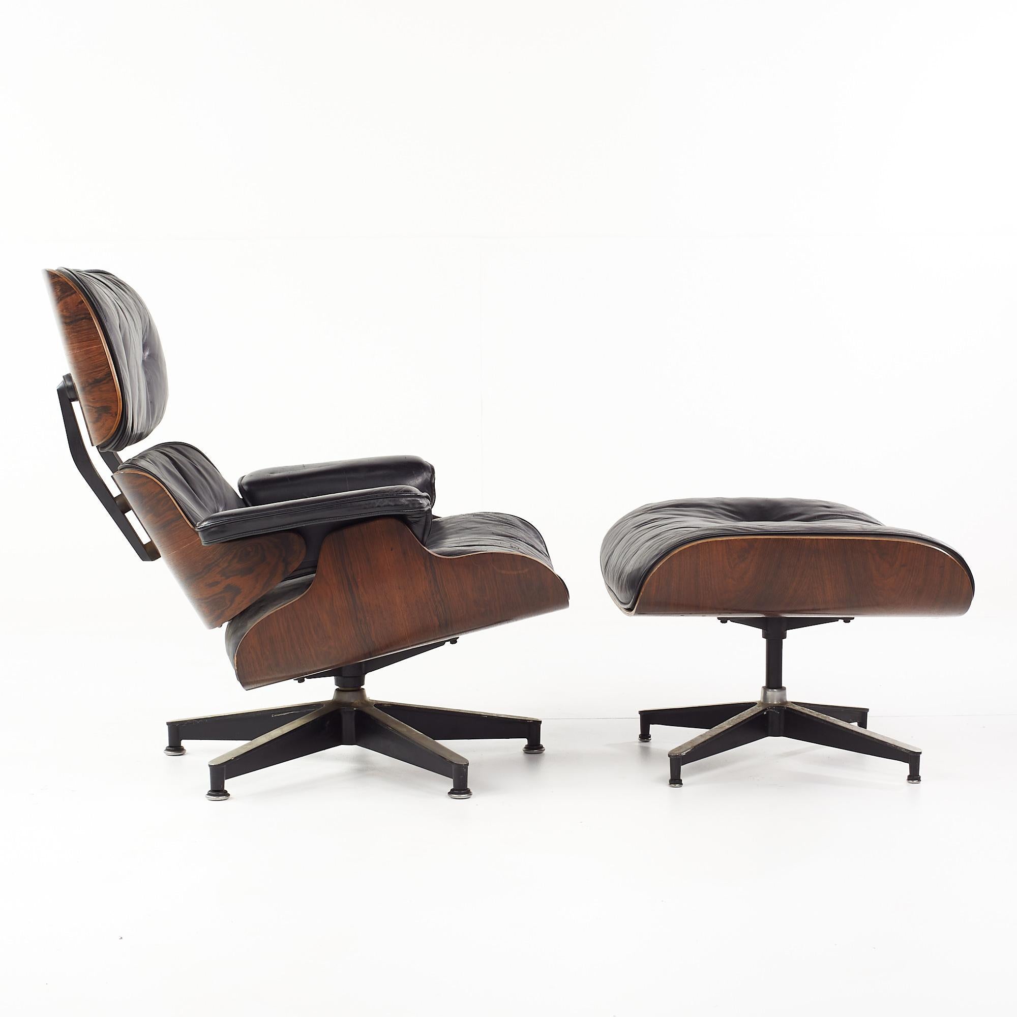 American Eames for Herman Miller Mid Century Rosewood Swivel Chair and Ottoman For Sale