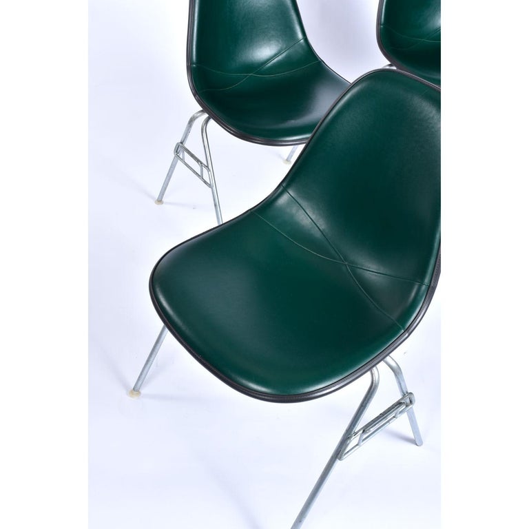 Eames for Herman Miller Stacking DSS Fiberglass Shell Chairs with Green Pads 1