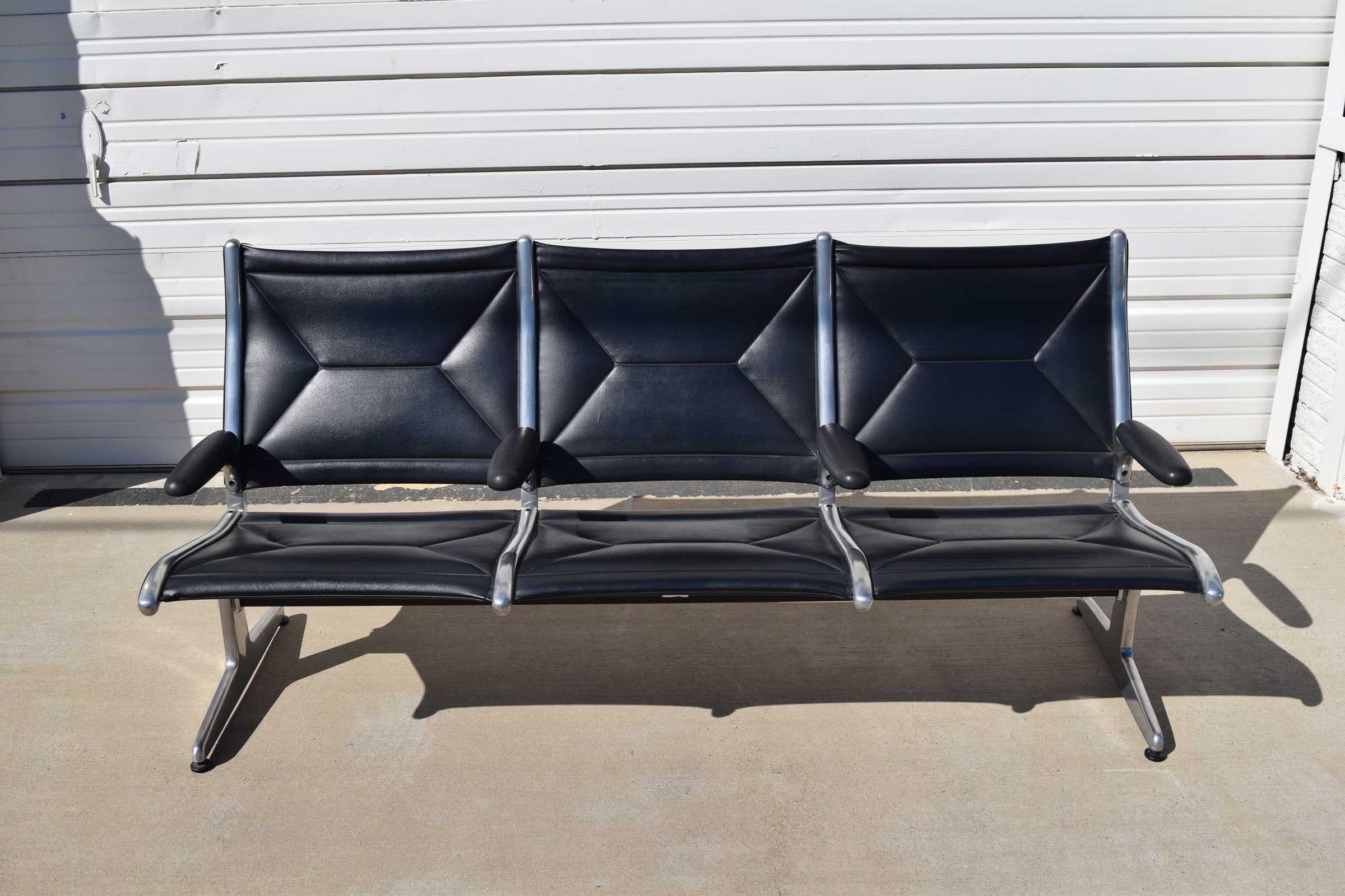 Offering an iconic tandem sling airport bench designed by Ray & Charles Eames for Herman Miller. The Eames were commissioned to design the perfect utilitarian seating for the first international airports in 1962. Created for comfort and convenience,
